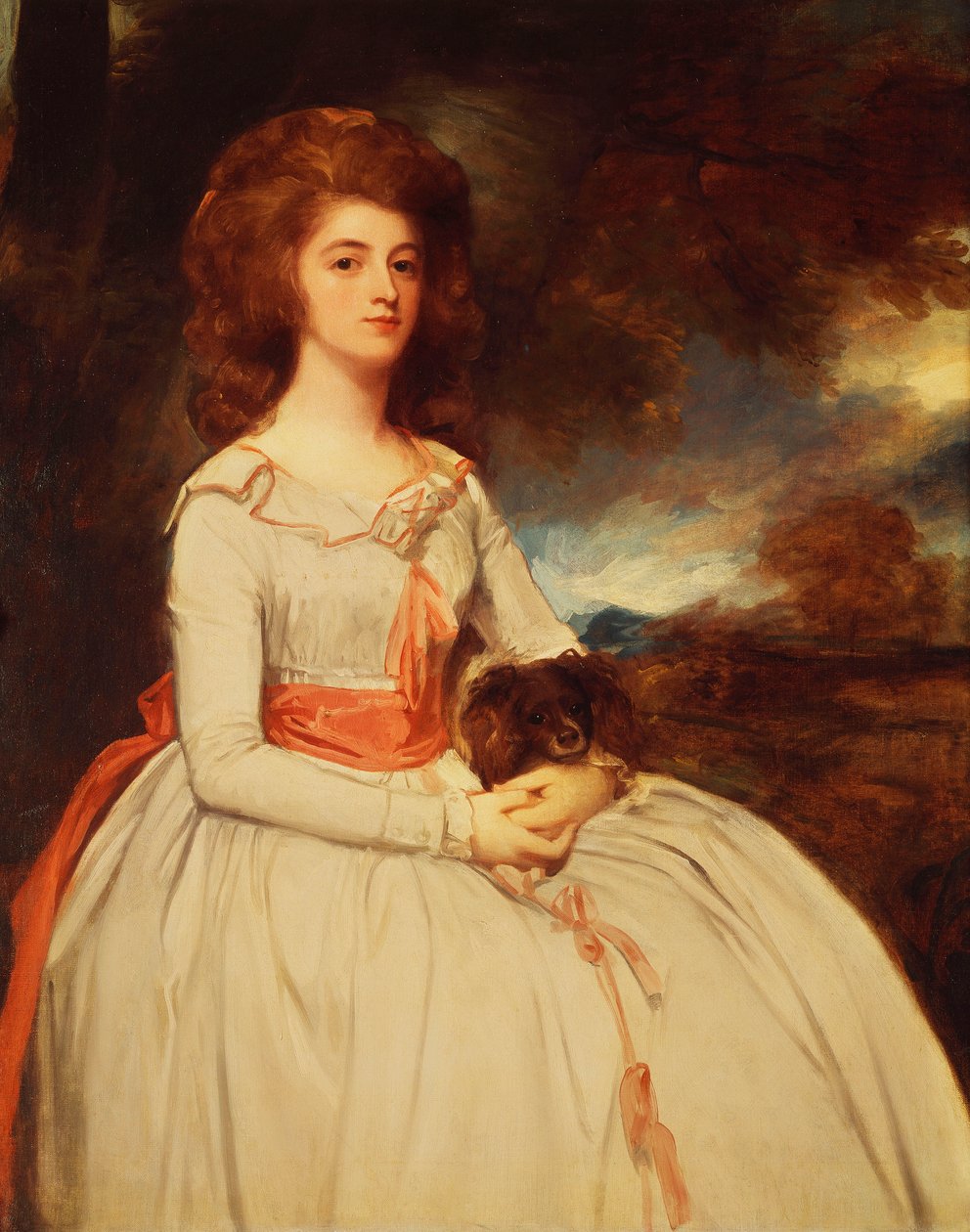 Porträtt av Mrs. Moody andra fru till Samuel Moody, sittande tre fjärdedels längd i en vit klänning trimmad med rosa rosetter och ett rosa skärp, håller en hund i knäet, i ett landskap, av George Romney