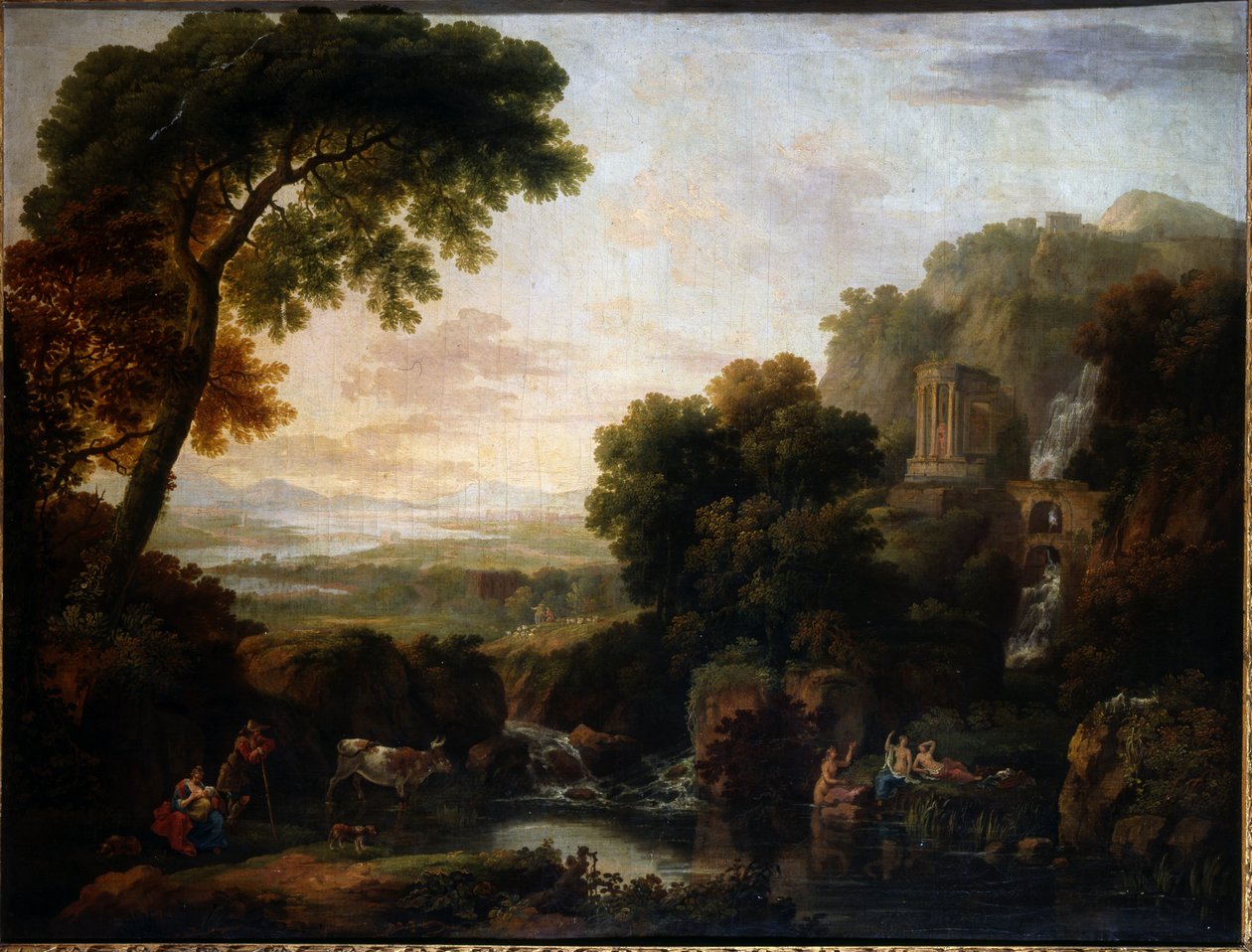 Italienskt landskap med en capriccio-vy av Tivoli, en herde och herdinna och boskap av George the Elder Barret