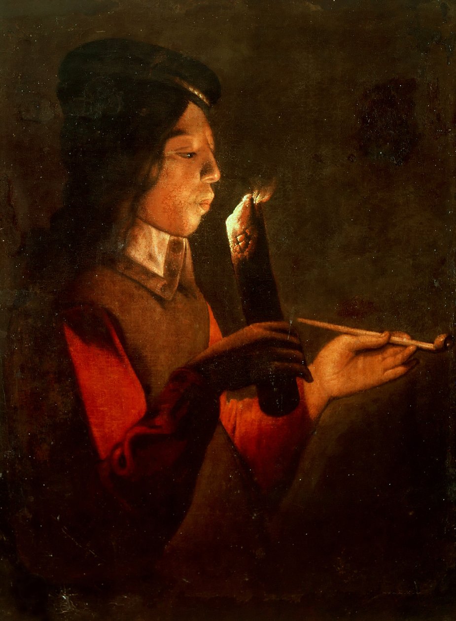 En ung pojke med en pipa som blåser på en eldhärlig Le Souffleur à la pipa. av Georges de, La Tour