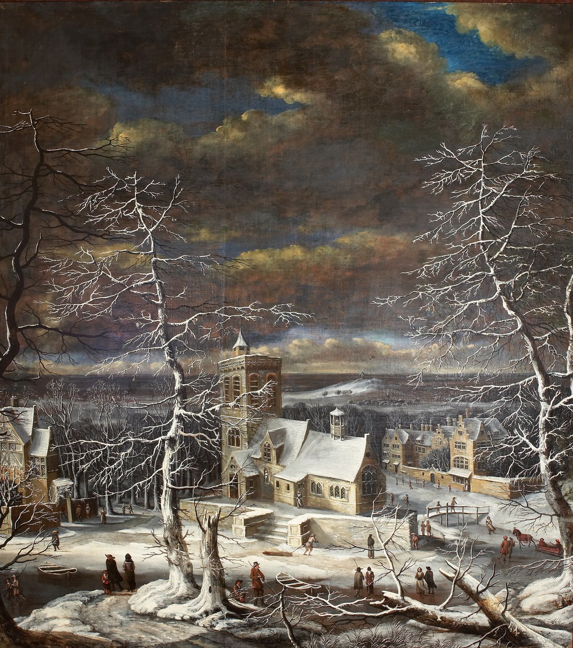 En vinterby i ett vidsträckt landskap med figurer på isen (olja på duk) av Gerard van Edema