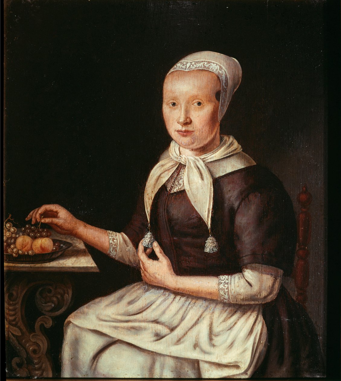 Porträtt av en tysk bonde på fruktfatet Målning av den tyska skolan. Trevise från 1600-talet, museo civico av German School