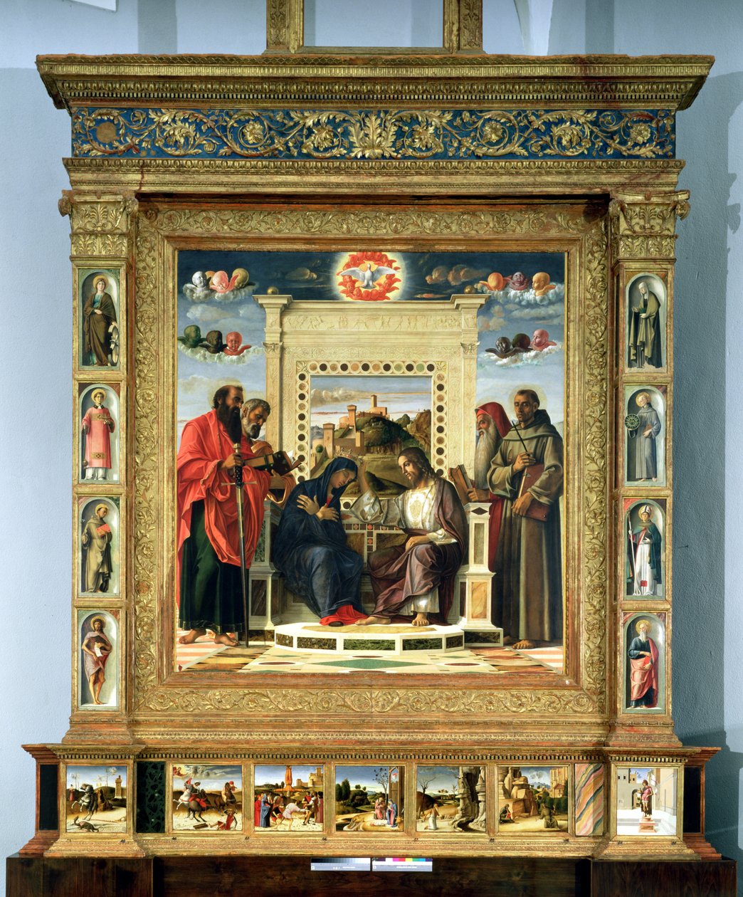 Jungfruns kröning med SS. Paulus, Peter, Hieronymus och Franciskus av Assisi med scener från helgonens liv i predellapanelen, känd som altartavlan Pala di Pesaro, ca 1474 (olja på panel) av Giovanni Bellini