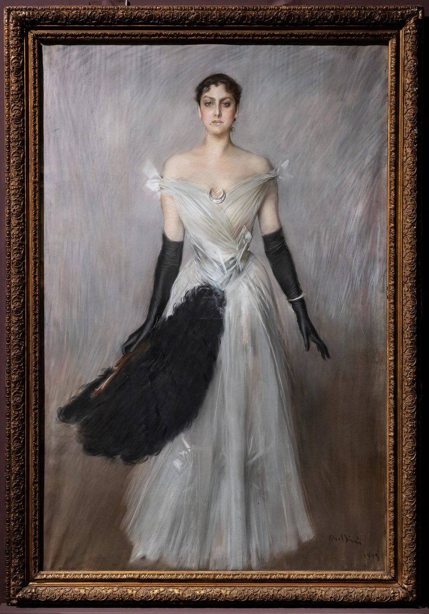 Porträtt av en dam i vitt med handskar och fläkt av Giovanni Boldini