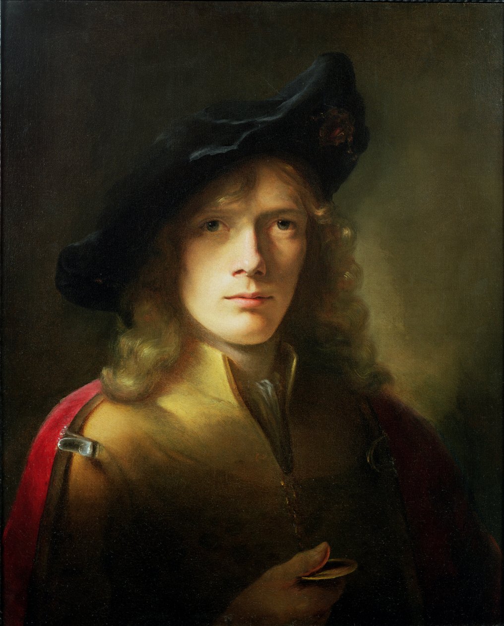 Porträtt av en ung man som håller en medalj av Godfrey Kneller
