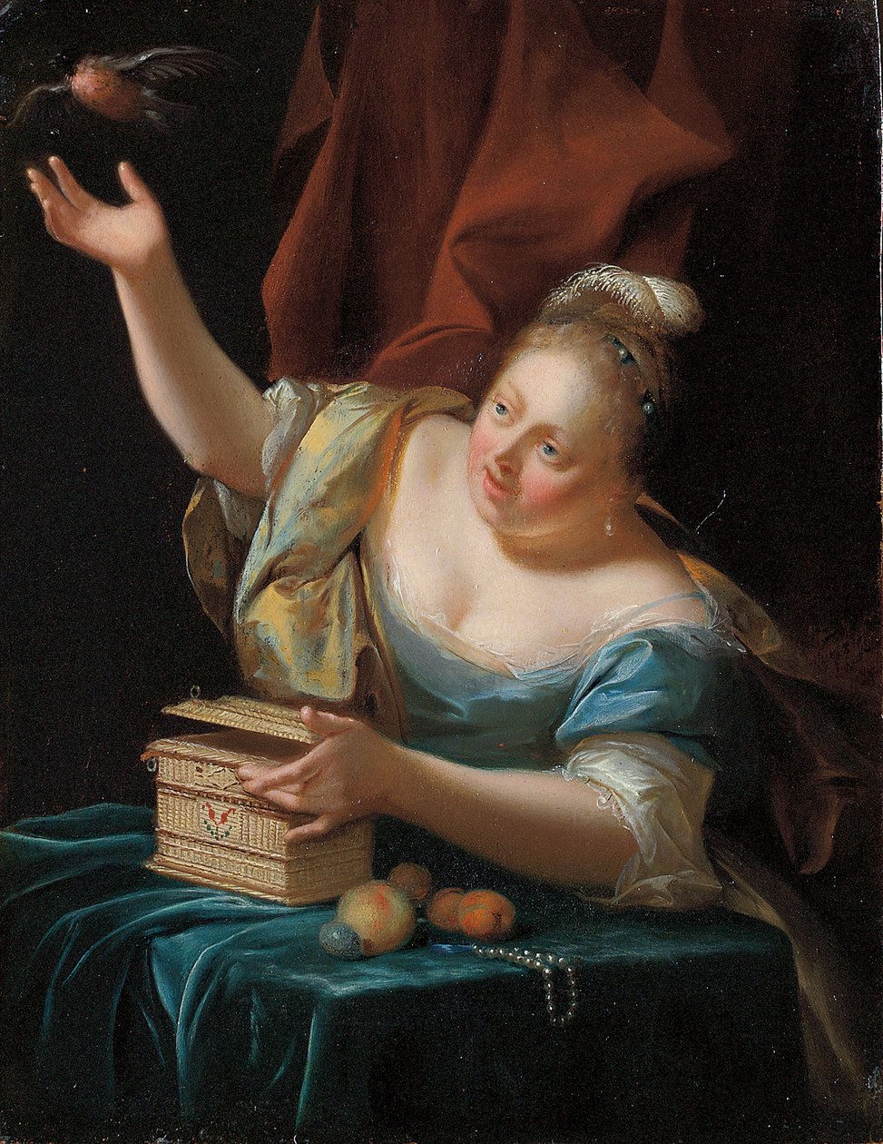 En kvinna som sitter vid ett bord i snygg kostym och befriar en sångfågel från sin bur av Godfried Schalcken