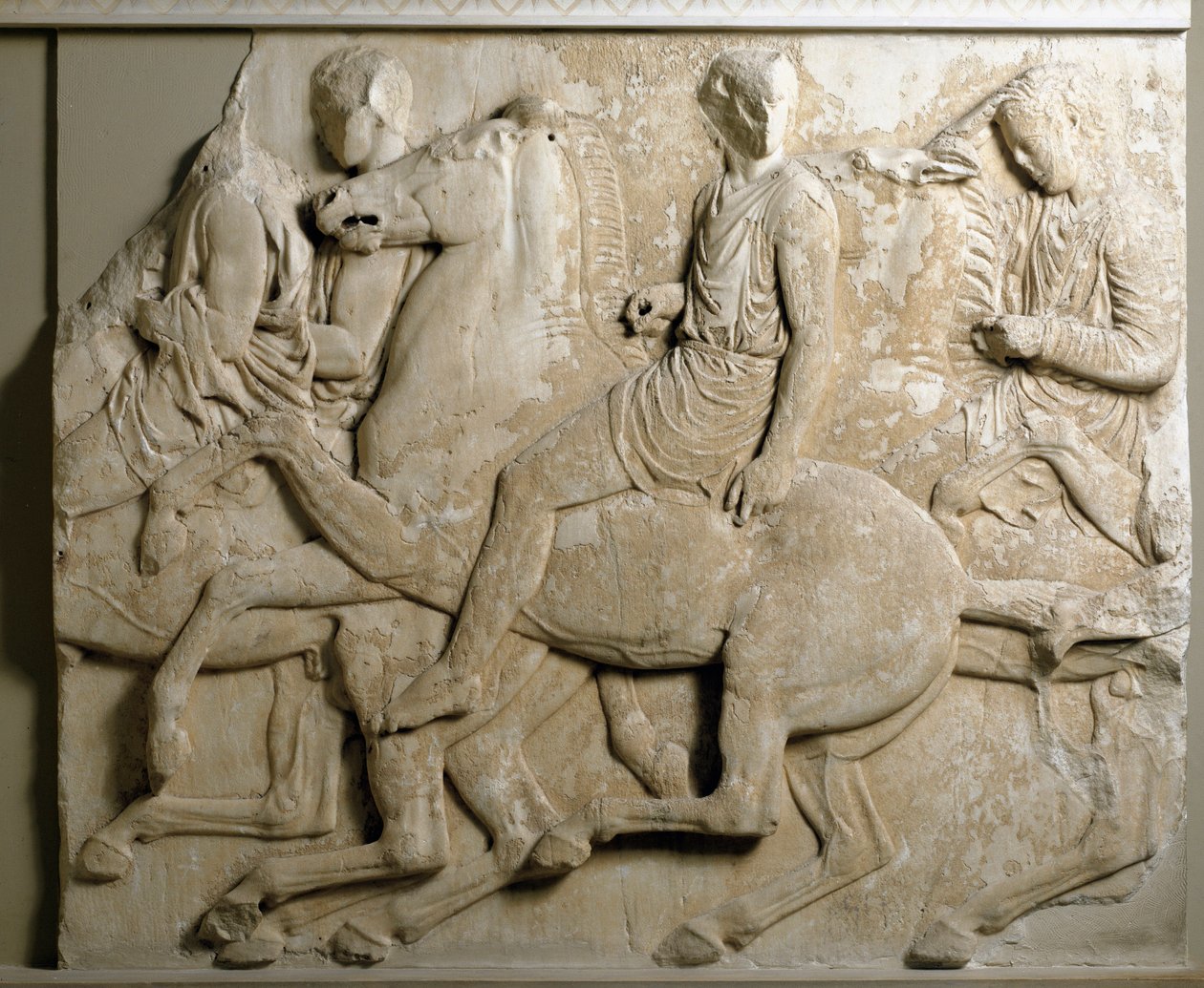 Grekisk konst: "" galopperande ryttare""" parthenonfris. Reliefstrumpor i marmor. 447-432 f.Kr. Aten, Akropolismuseet av Greek