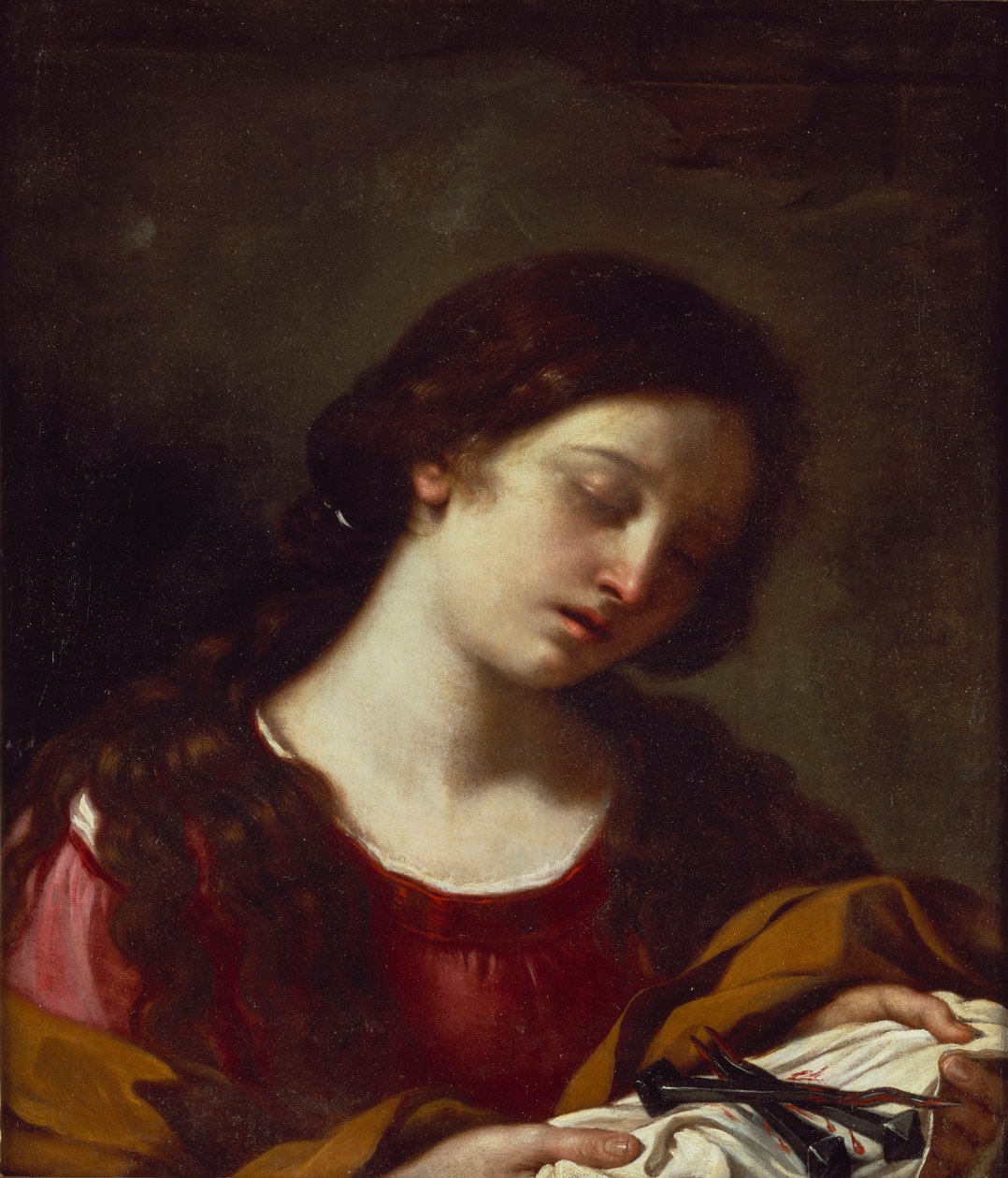 Magdalen som begrundar passionens spikar av Guercino