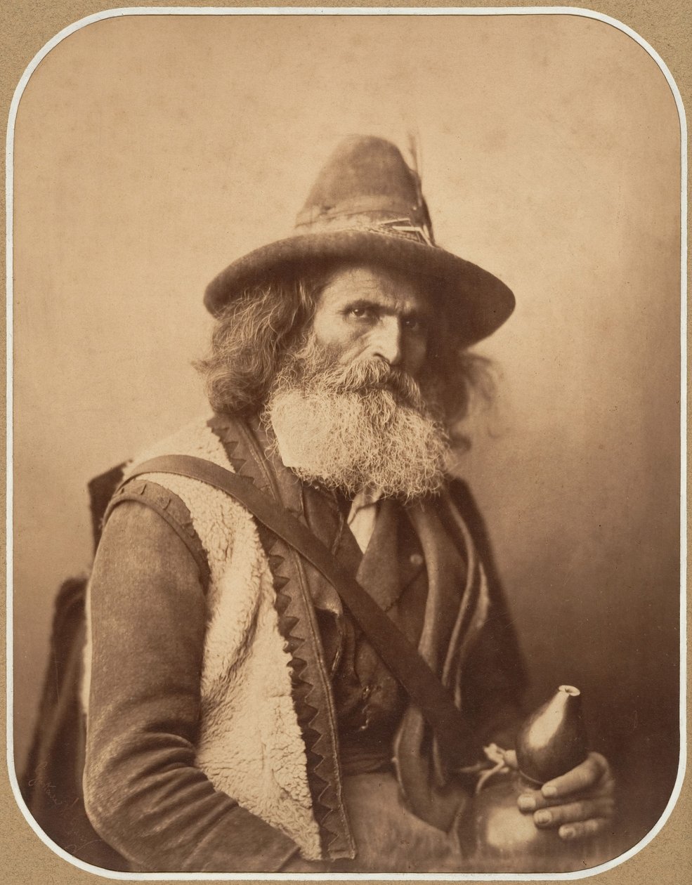 [En italiensk gatumusiker], ca. 1856. av Gustave Le Gray