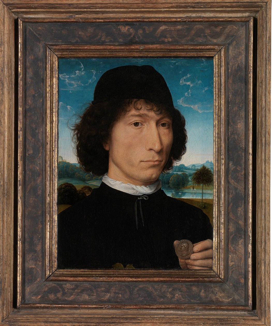 Porträtt av en man med en romersk medalj av Hans Memling