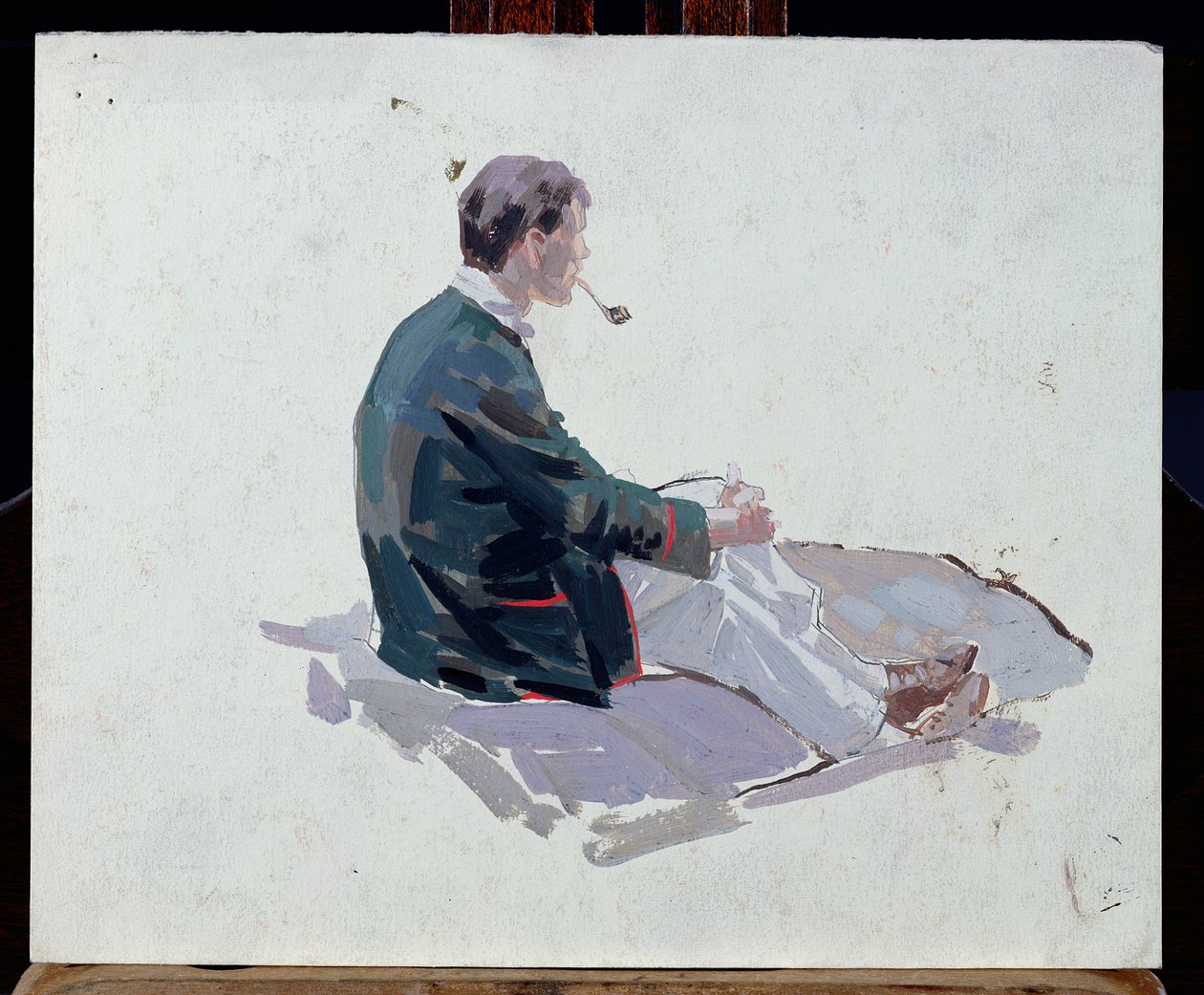Man sitter på stenar och röker pipa (olja på papper) av Harry Watson