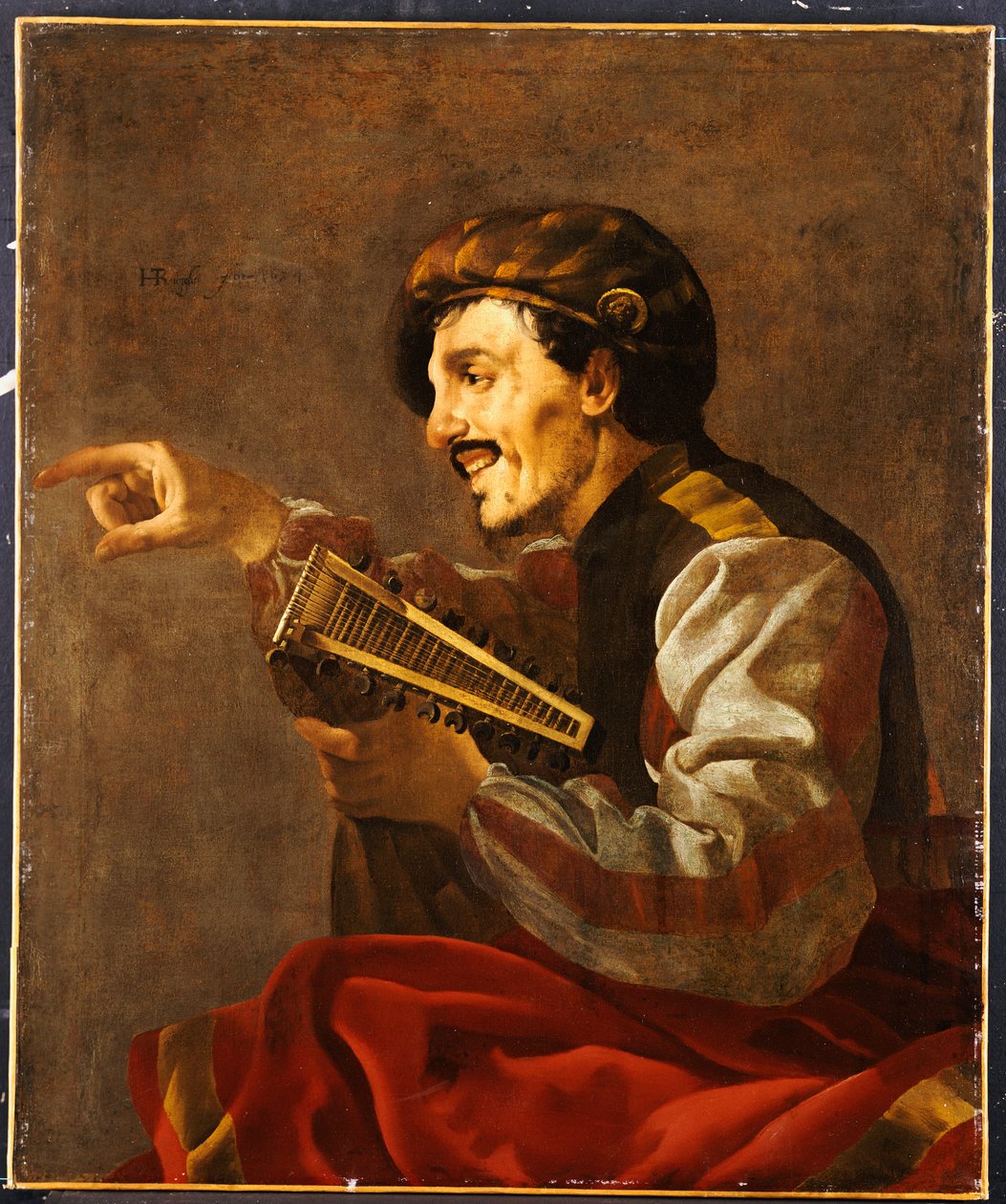 En sittande lutanist som pekar av Hendrick ter Brugghen