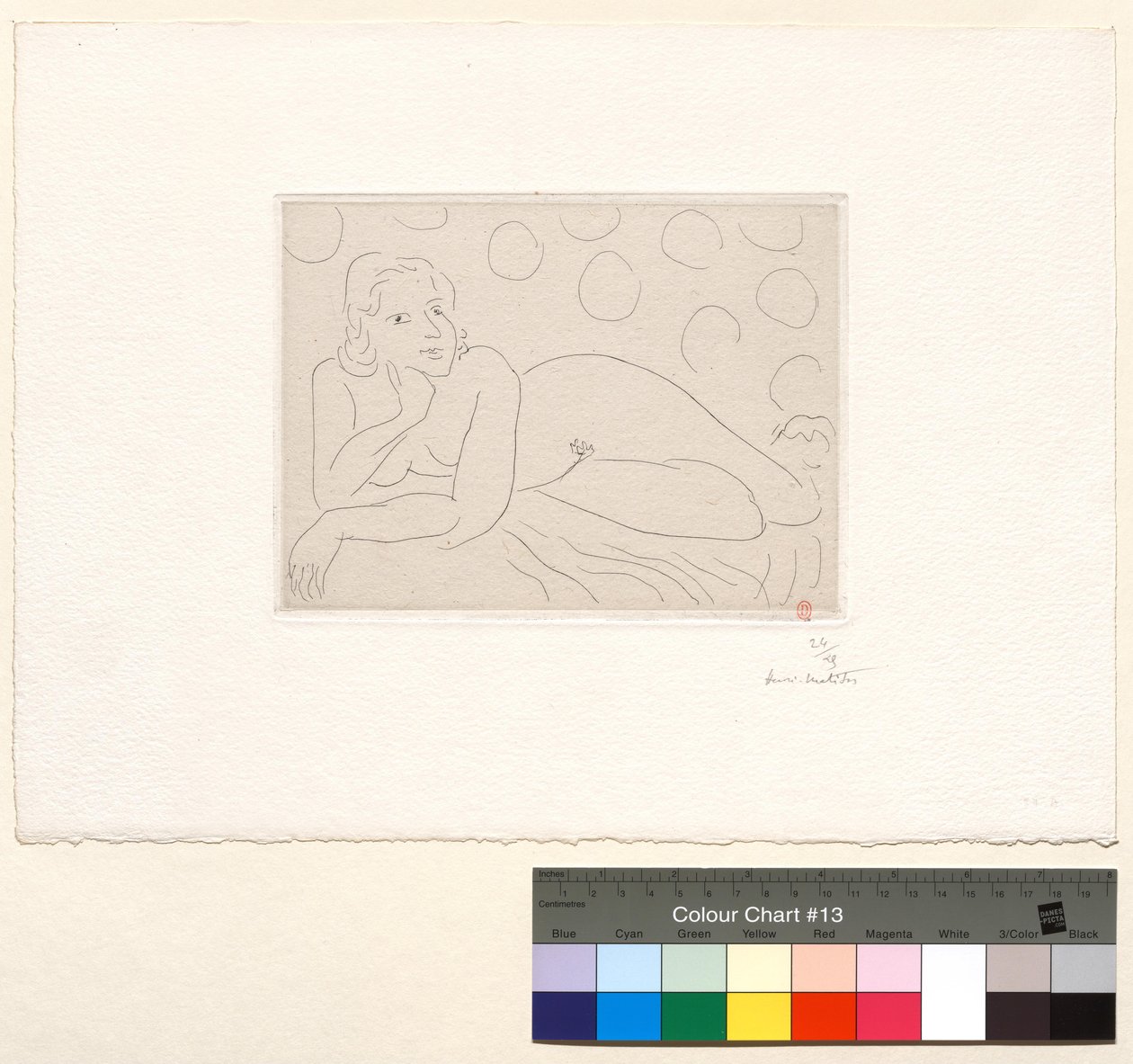 Liggande nakenmodell mot bakgrund med cirkelformade mönster av Henri Matisse