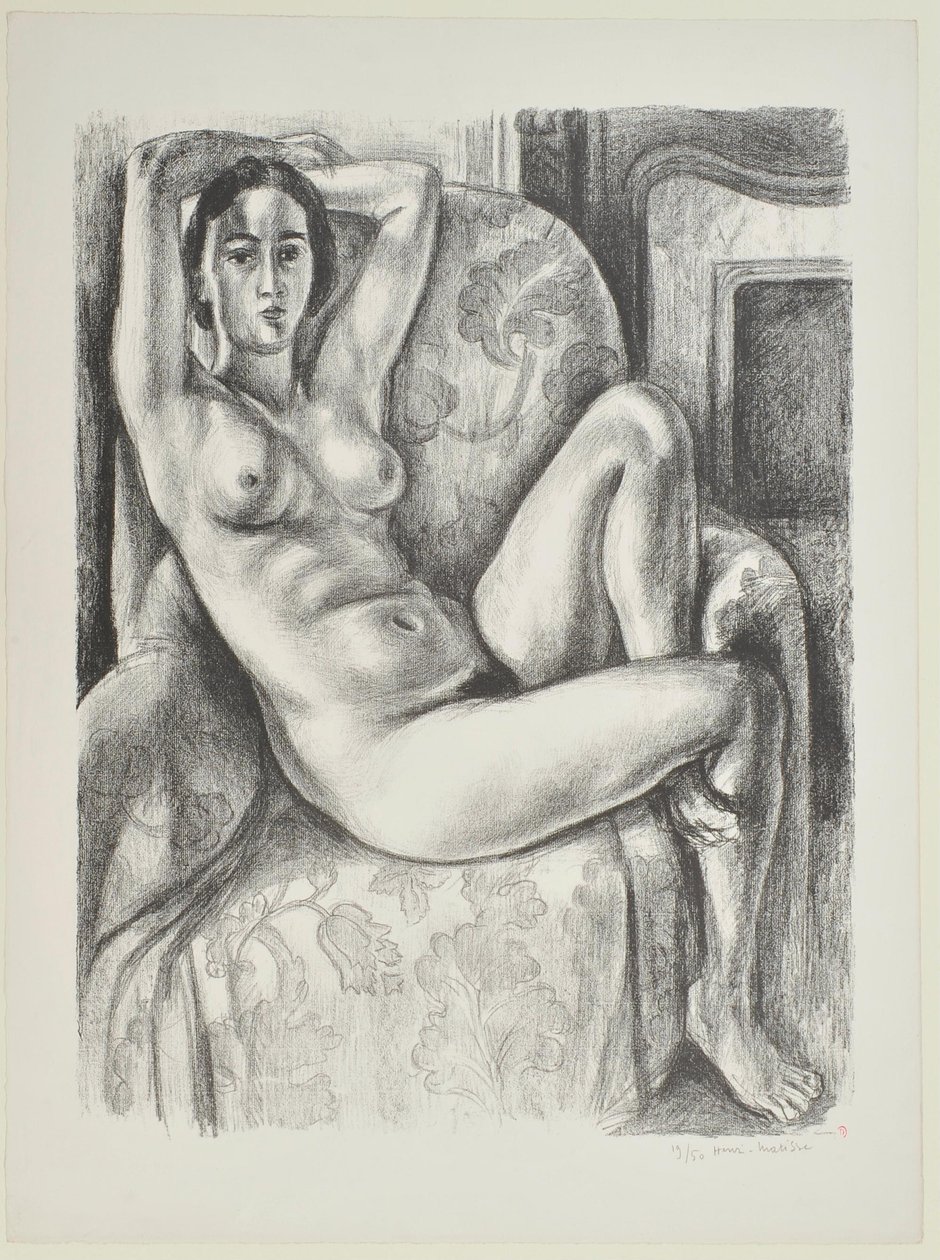 Nakenmodell med blå kudde bredvid en öppen spis av Henri Matisse
