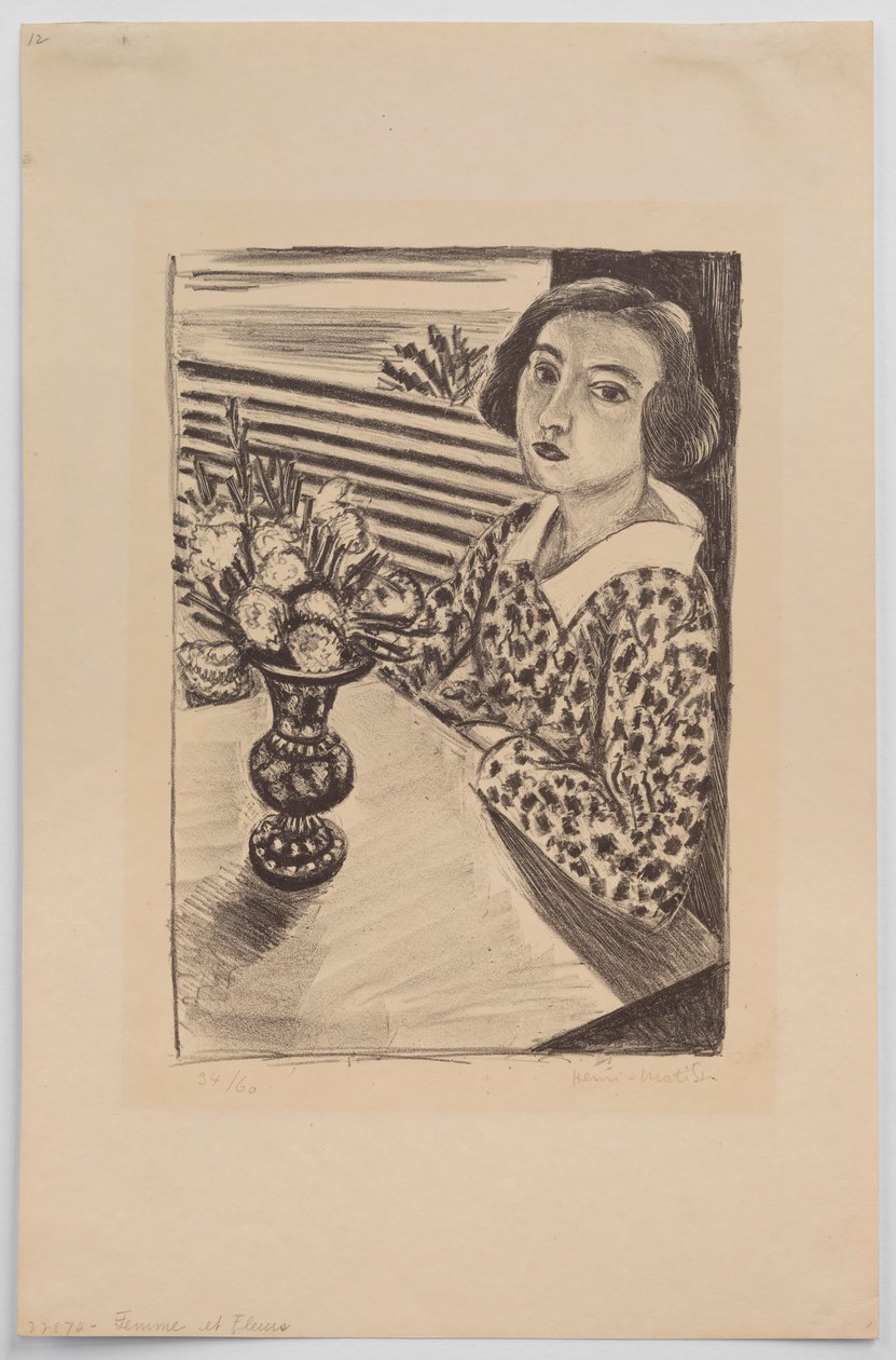 Sittande ung flicka med en bukett blommor av Henri Matisse