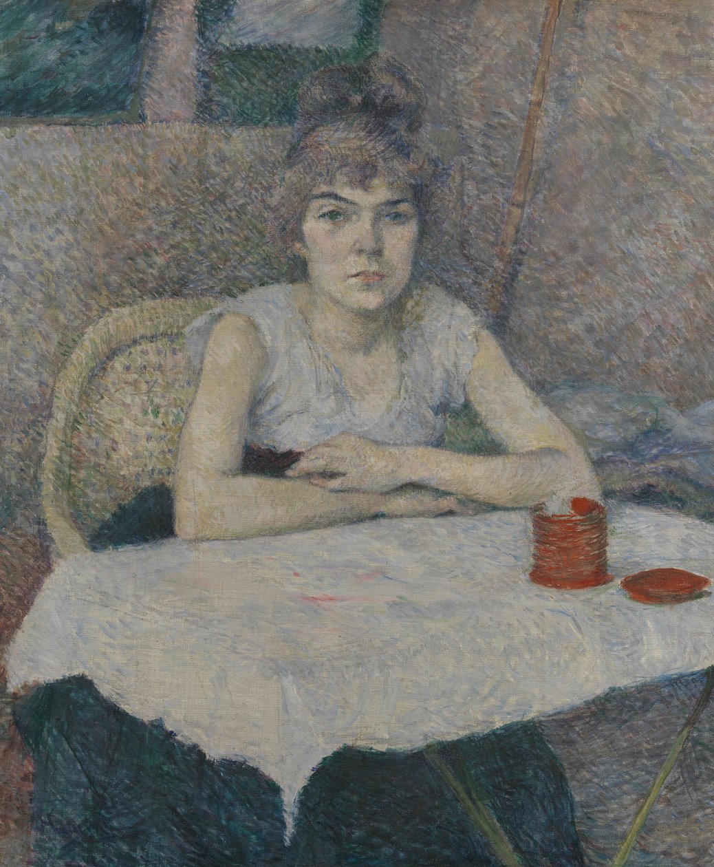 Ung kvinna vid ett bord av Henri de Toulouse Lautrec