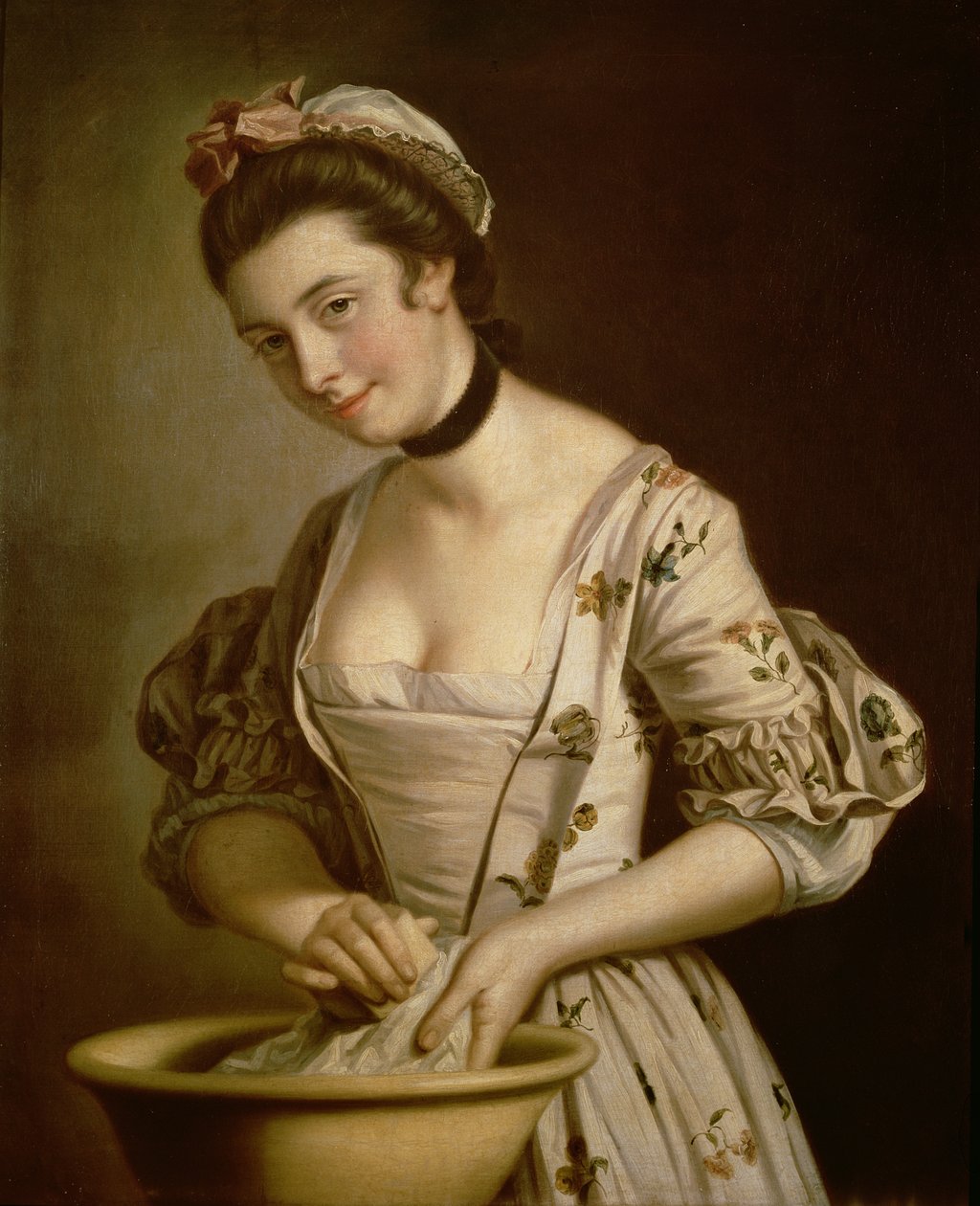 En jungfru som tvålar linne av Henry Robert Morland