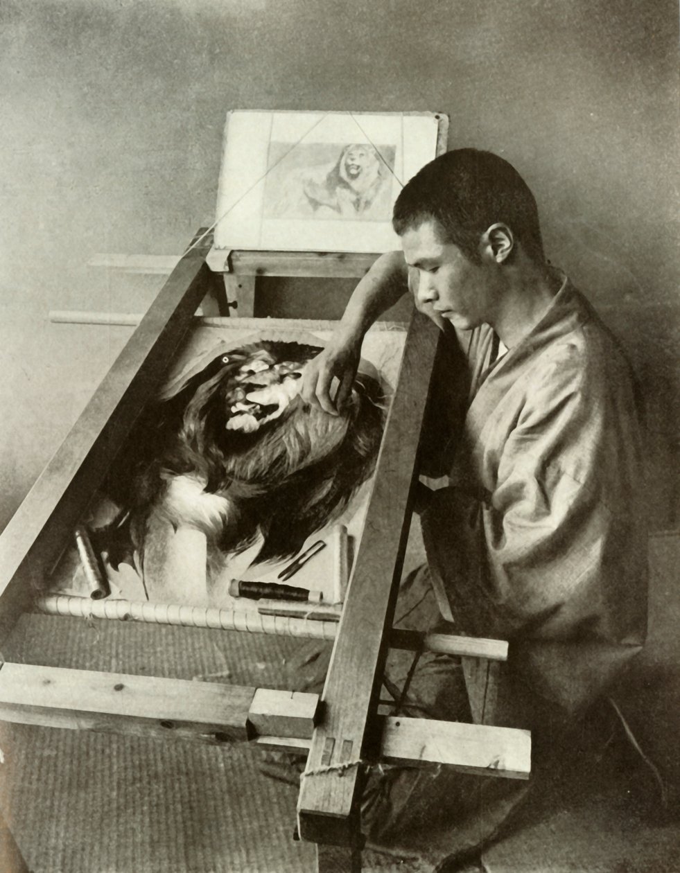 Broderaren, 1910. av Herbert Ponting