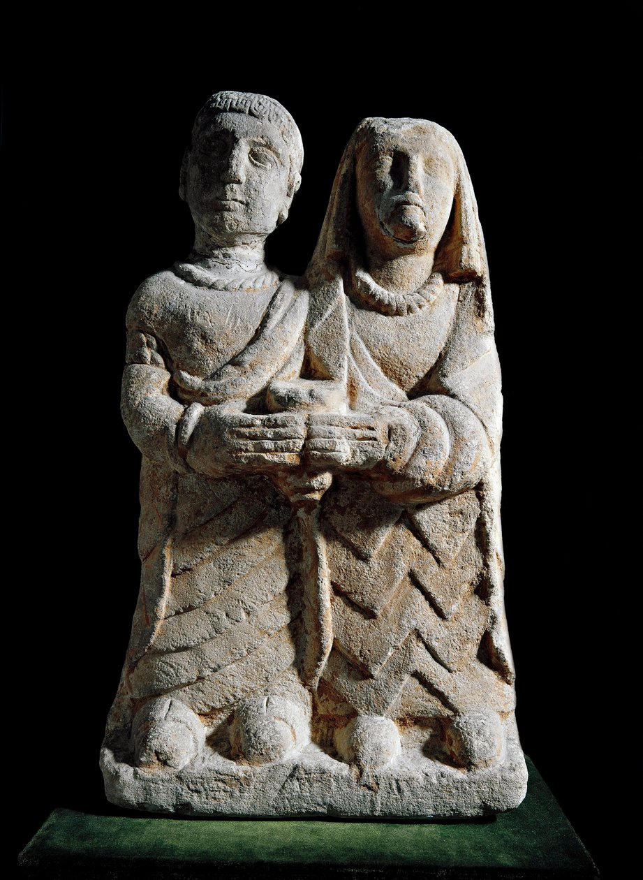 Iberisk konst: statyett av ett par som ger ett offer. Skulptur från Albacete, Spanien. 300-talet f.Kr. Madrid, Arkeologiska museet av Iberian