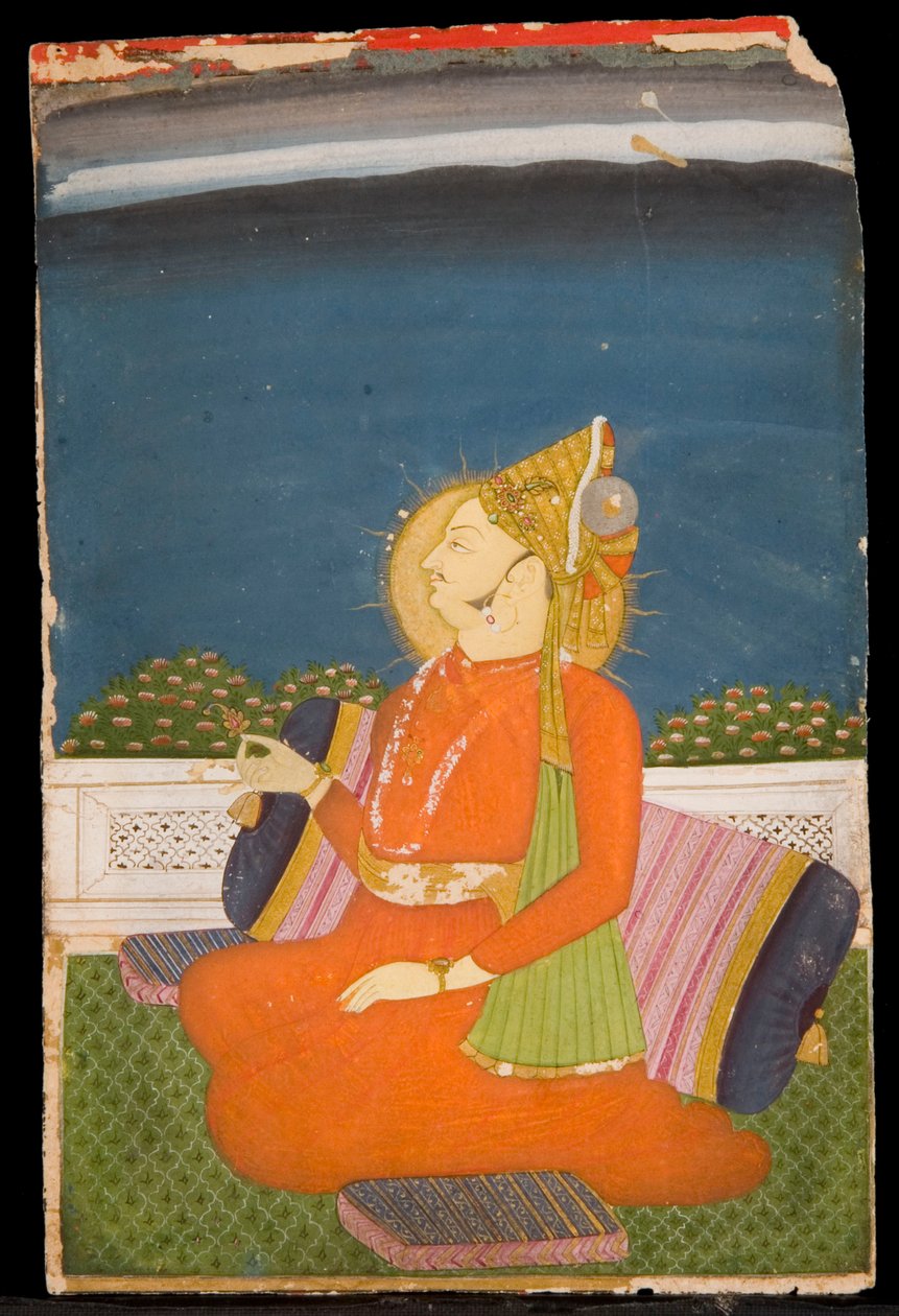 En juvelförsedd dignitär, bär en plymerad turban, håller en lotusknopp, sitter på en terrass av Indian School