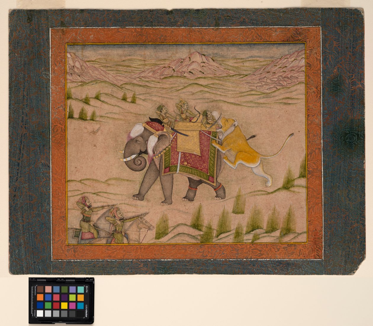 Ett lejon attackerar ett jaktsällskap på toppen av en elefant, ca 1810 (ogenomskinlig akvarell och guld på papper) av Indian School