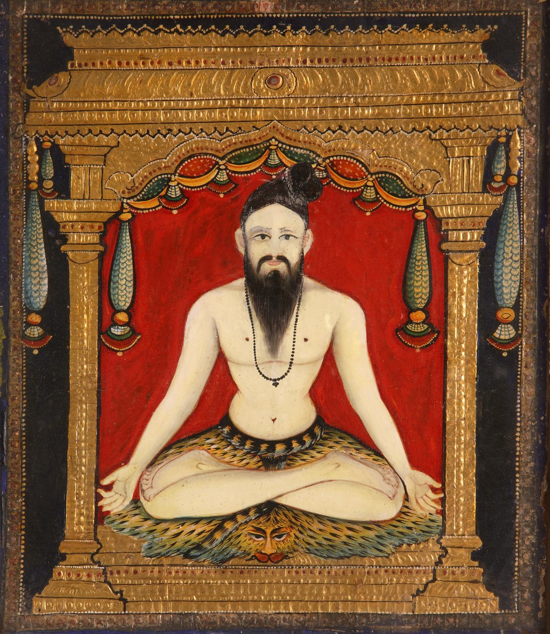 En sadhu (lim, färg och guld) av Indian School