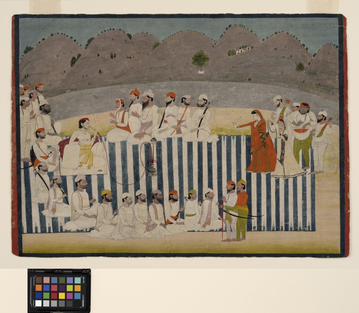 Bahadur Singhs son tittar på en nautch, ca 1800 (ogenomskinlig akvarell och guld på papper) av Indian School