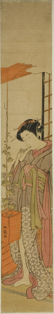 Courtesan beundrar morgonhärligheter medan hon rengör sina tänder av Isoda Koryusai