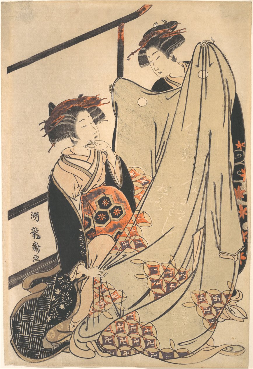 Två skönheter som tittar på en kimono av Isoda Koryusai