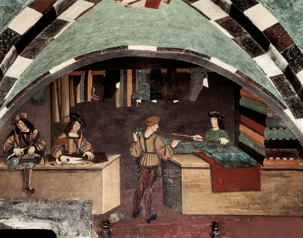 Skräddarbutik. En man syr, en annan klipper tyget och en tredje säljer textilen till en kund. Fresco Castle Issogne (1400-talet). av Italian School