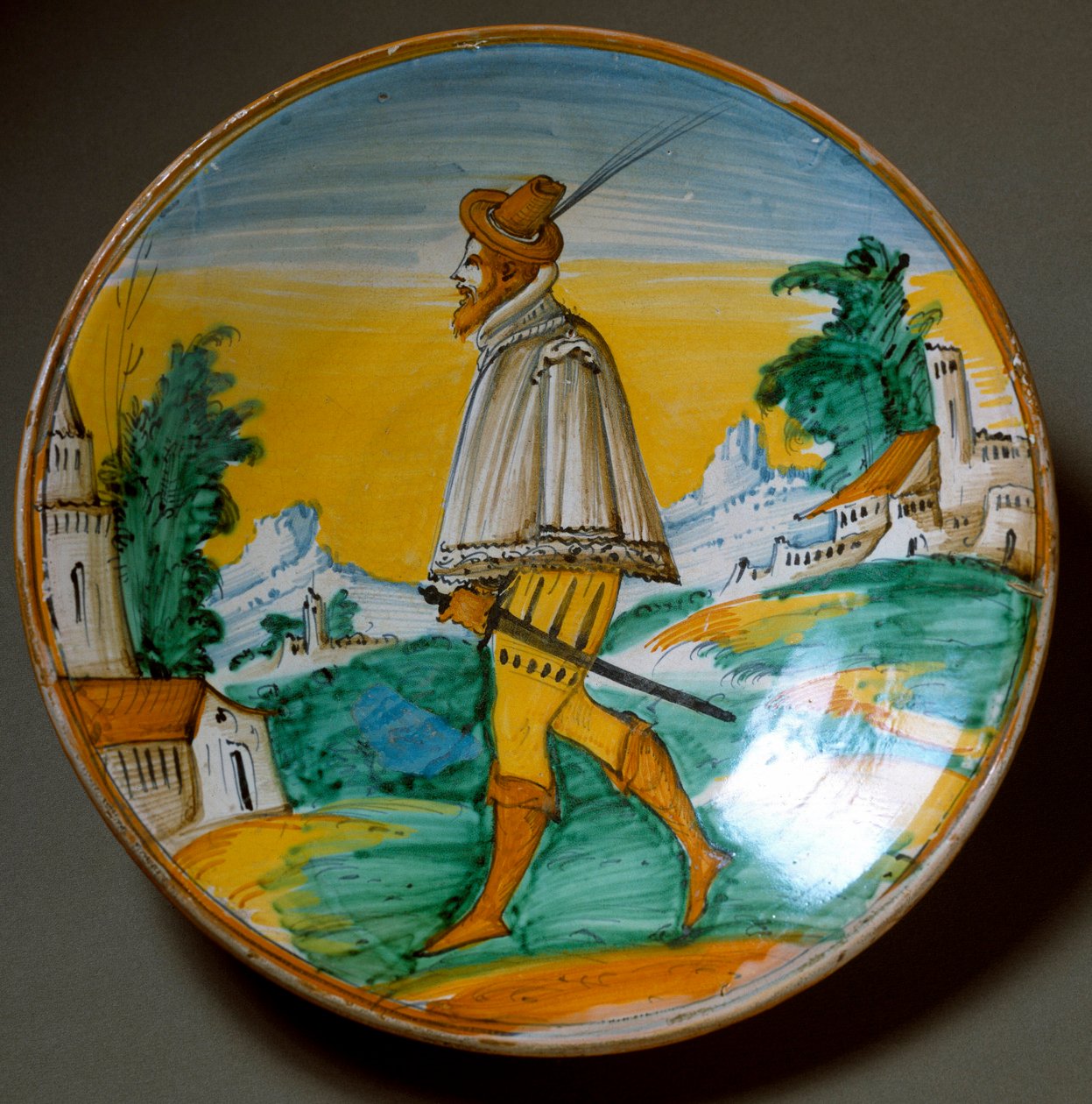 Ung vapenman. Keramisk platta tillverkad i Viterbo, Italien. Slutet av 1500-talet Florens, Museo Nazionale del Bargello av Italian School