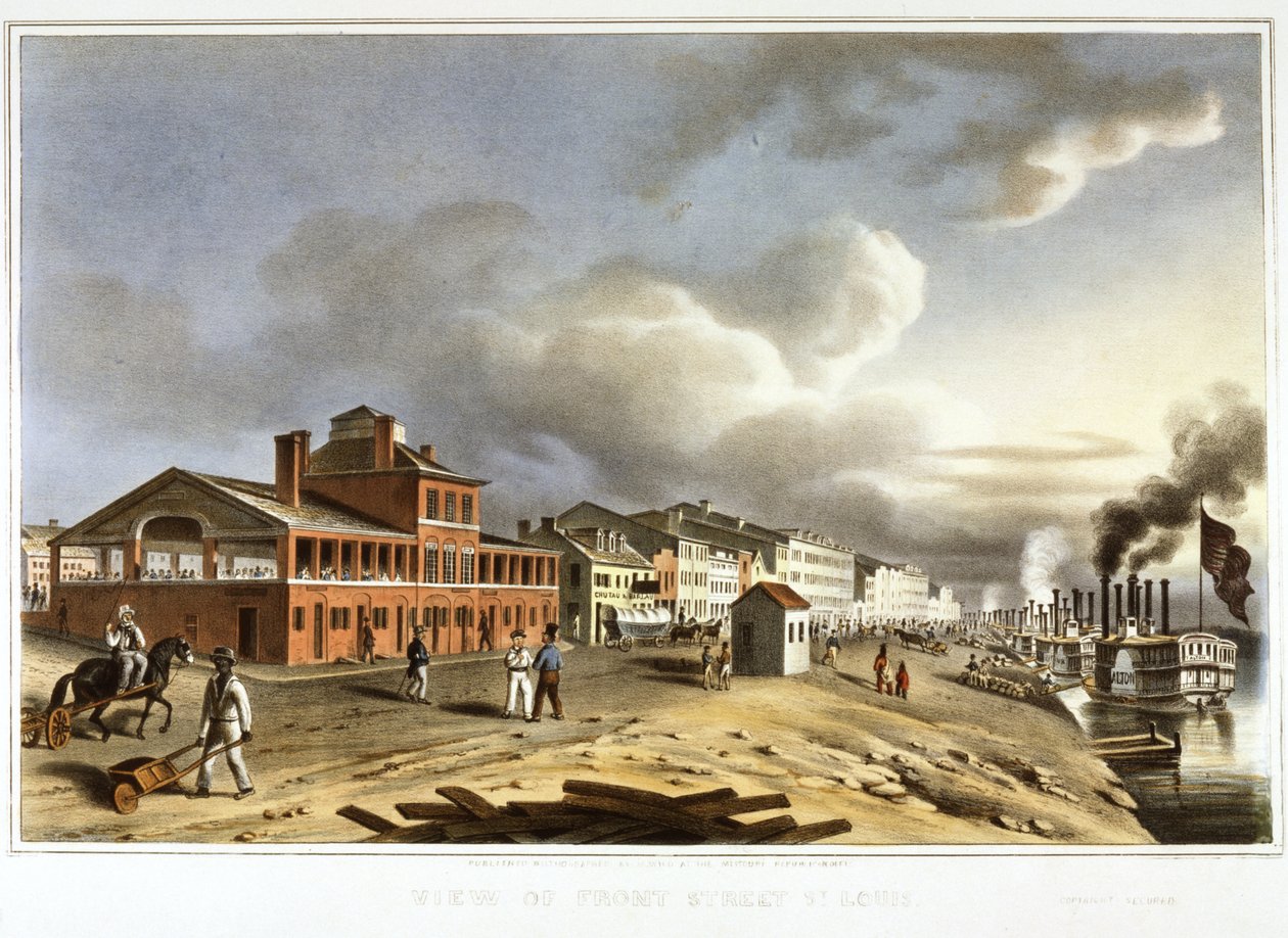 Horizontal hand-colored lithograph showing Front Street on the St. Louis levee from the southeast. The steamer Alton is shown at the head of a long line of riverboats moored at the levee. Near the Alton, two American Indians appear to be contemplating the  av J. C. Wild