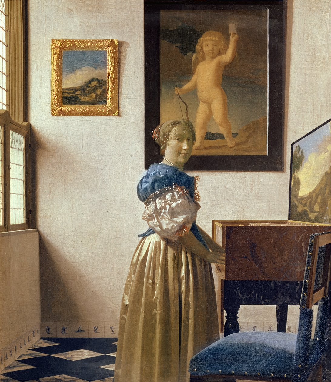 En ung kvinna som står vid en jungfru, c.1670-72 av Jan Vermeer van Delft