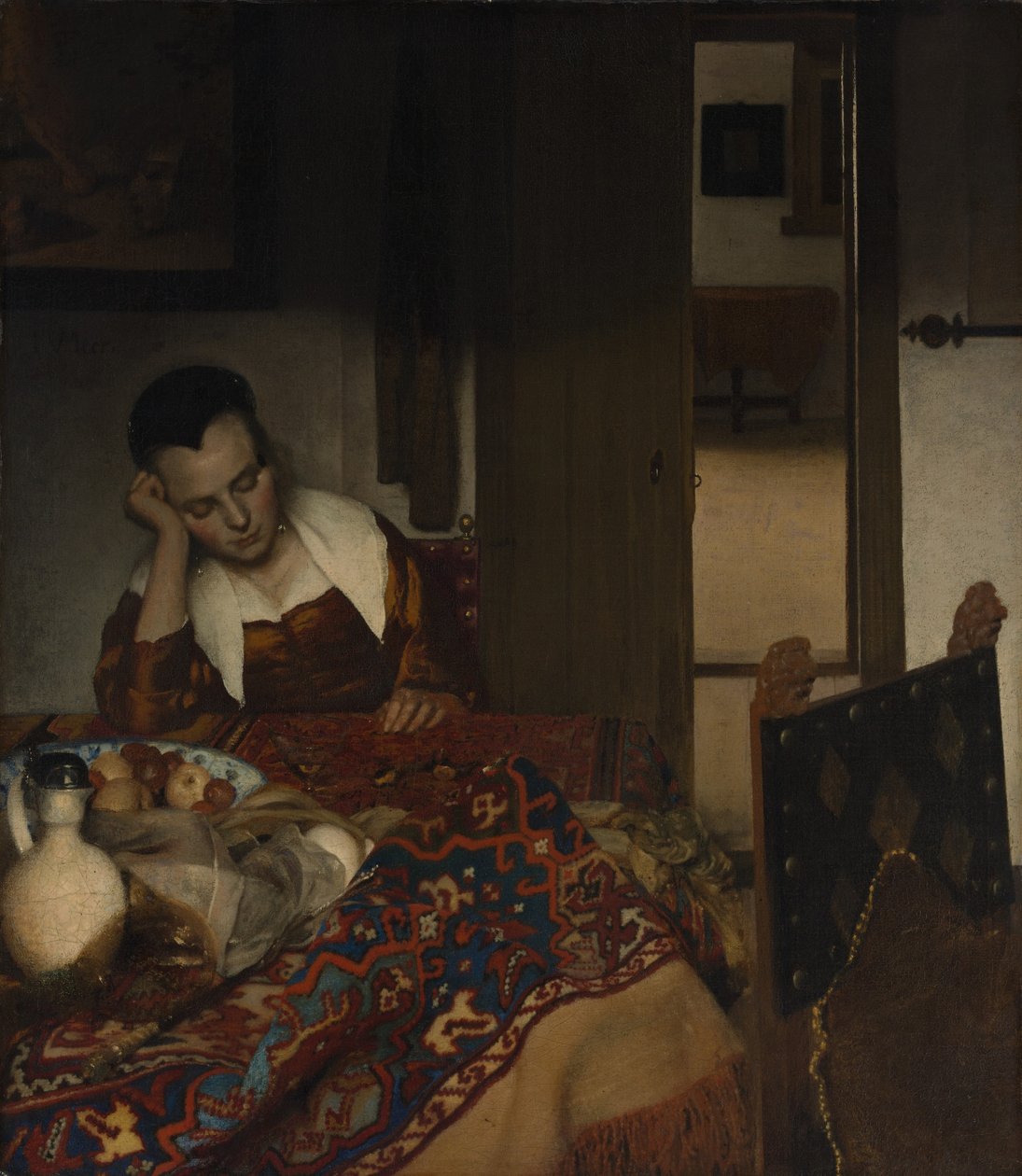 Flicka sover vid ett bord av Johannes Vermeer