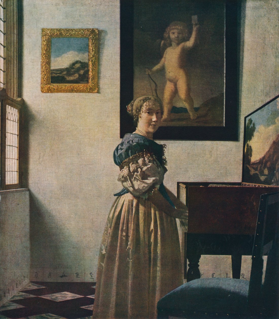 En ung kvinna som står vid en jungfru, cirka 1670-1672 av Jan Vermeer van Delft