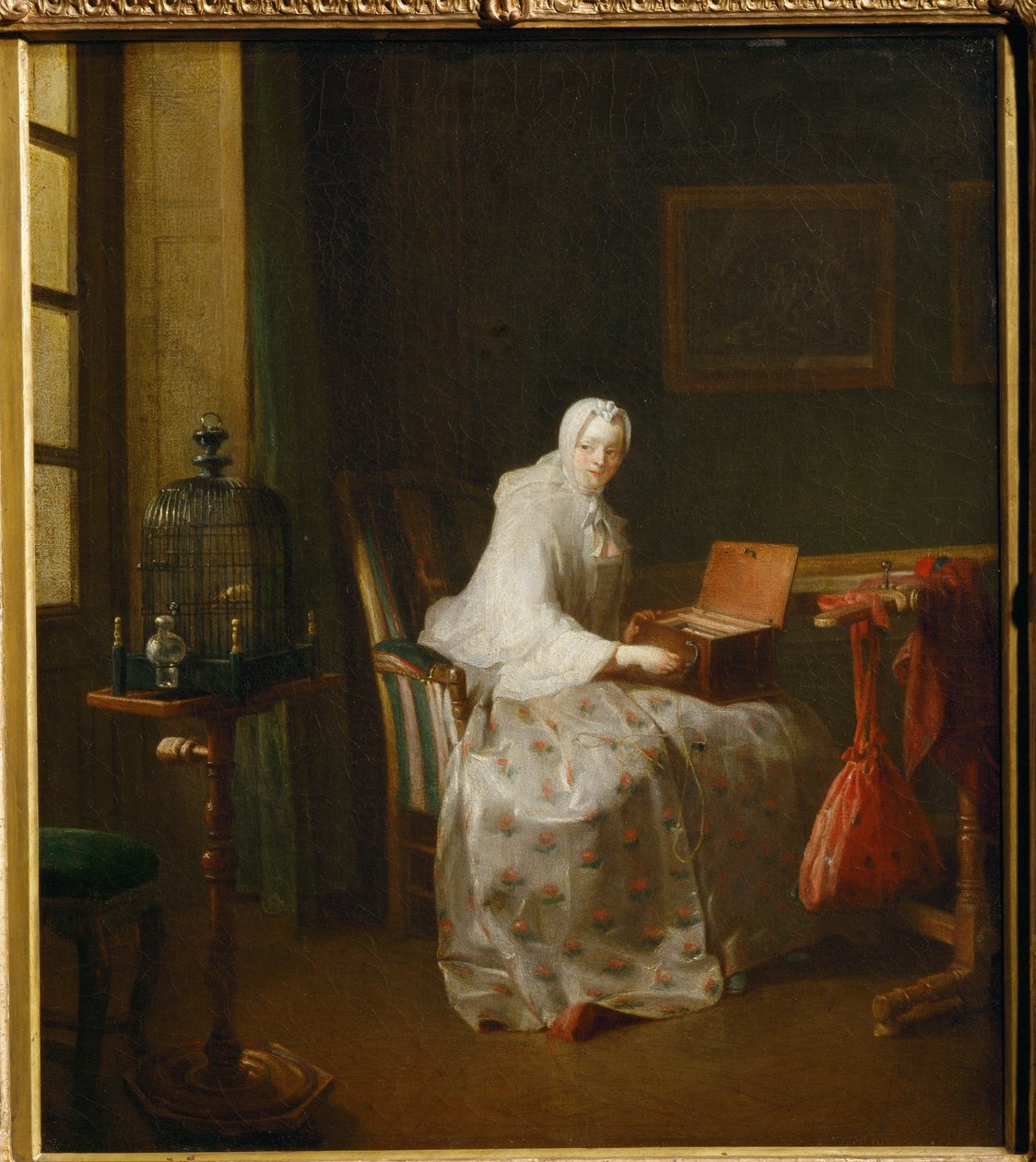 La serinette, dit aussi Dame variant ses amusements - en serinette är en liten mekanisk orgel som används för att lära fåglar att sjunga ... av Jean Baptiste Simeon Chardin