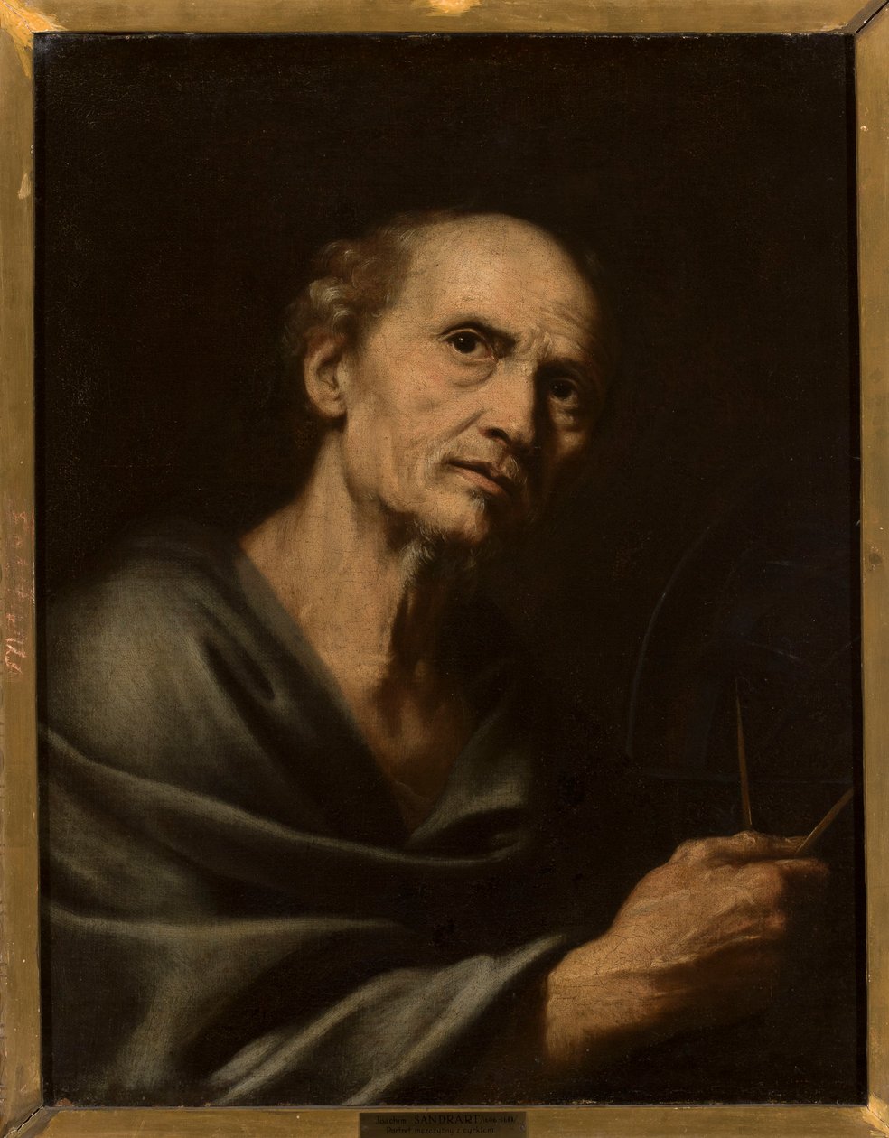 Porträtt av en man med passare av Joachim von Sandrart