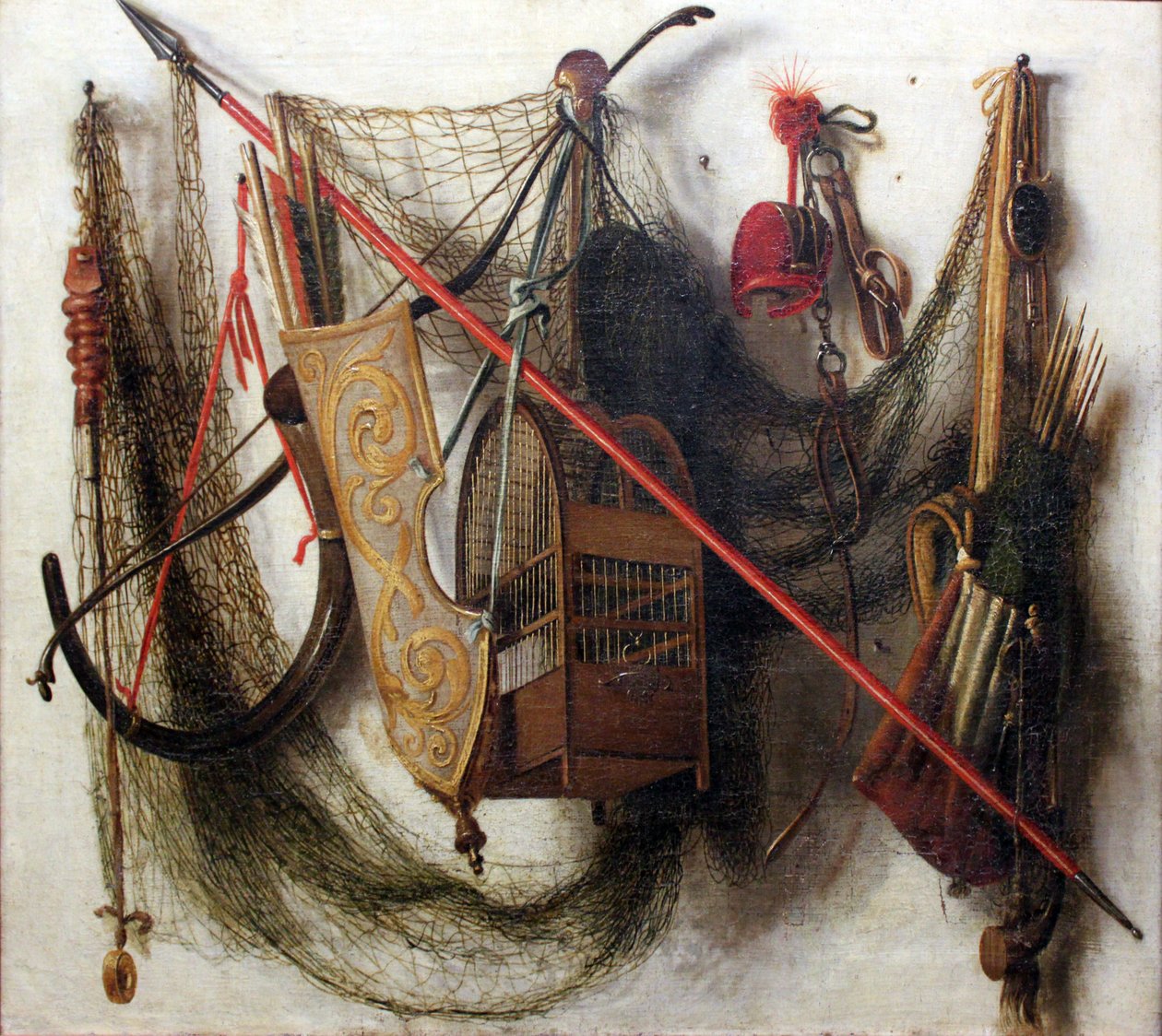 Still life with hunting weapons and devices av Johannes Leemans