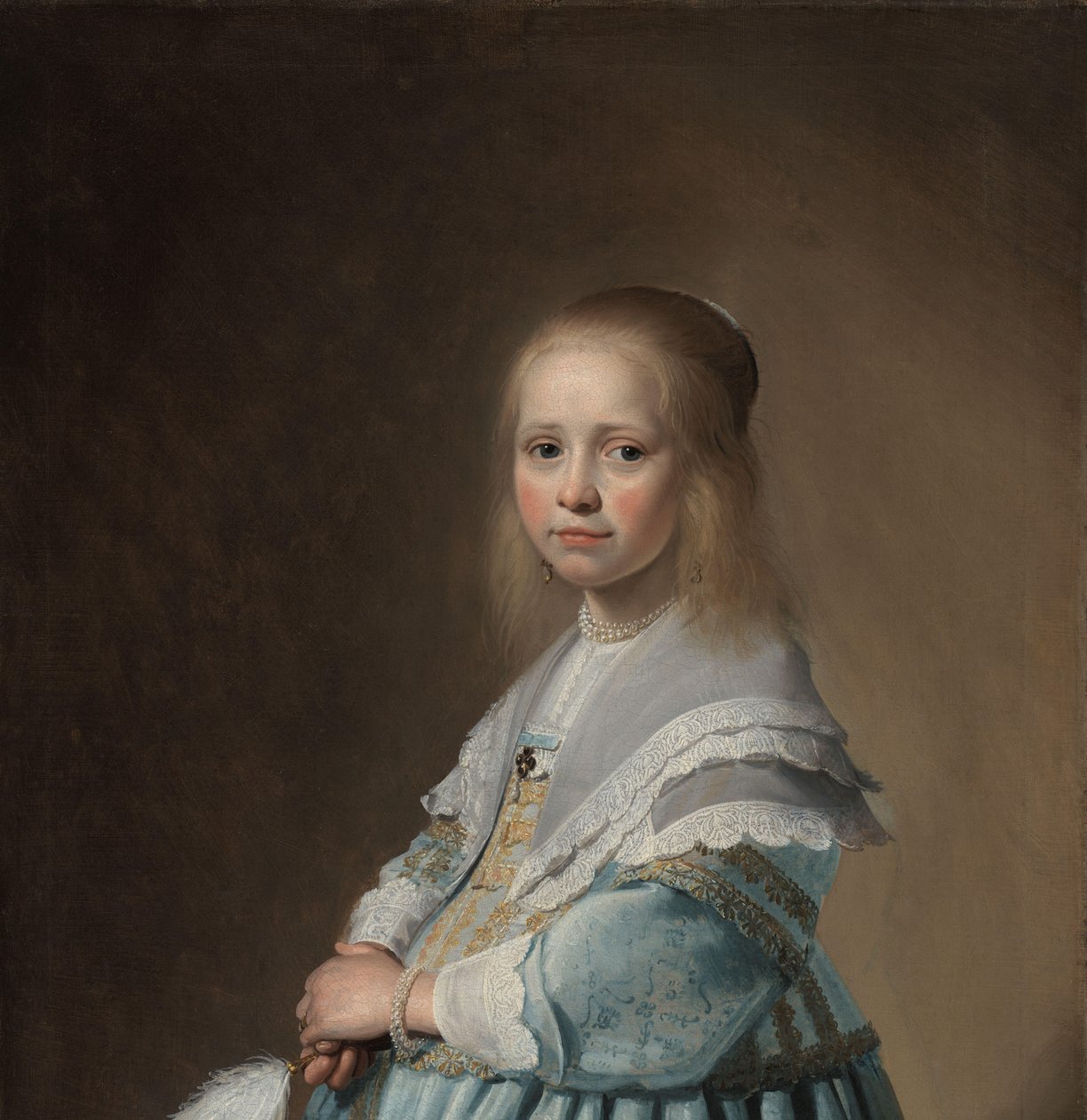 Porträtt av en flicka klädd i blått Porträtt av en flicka i blått av Johannes Cornelisz. Verspronck