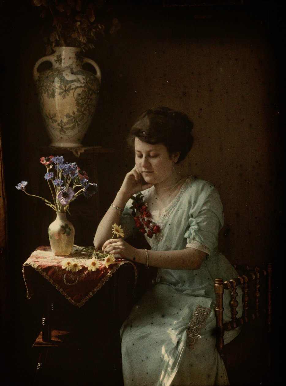 Kvinna med blommor av Johannes Hendrikus Antonius Maria Lutz