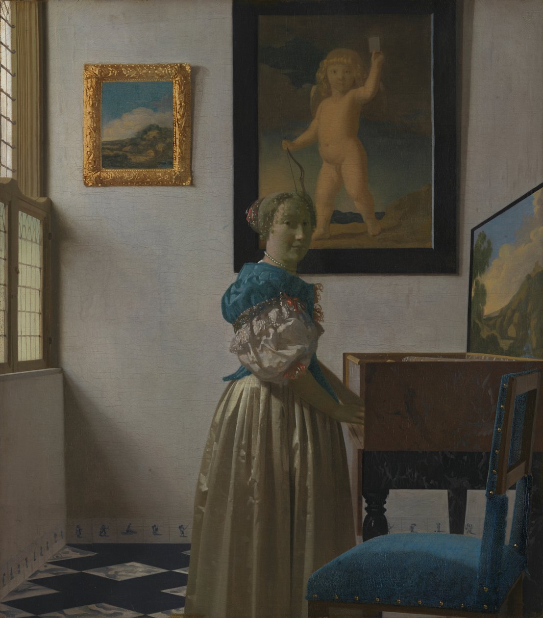 Eine junge Frau an einem Virginal av Johannes Vermeer