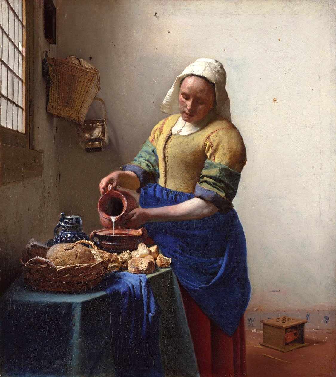 Arabiska:  Mjölkerskan av Johannes Vermeer