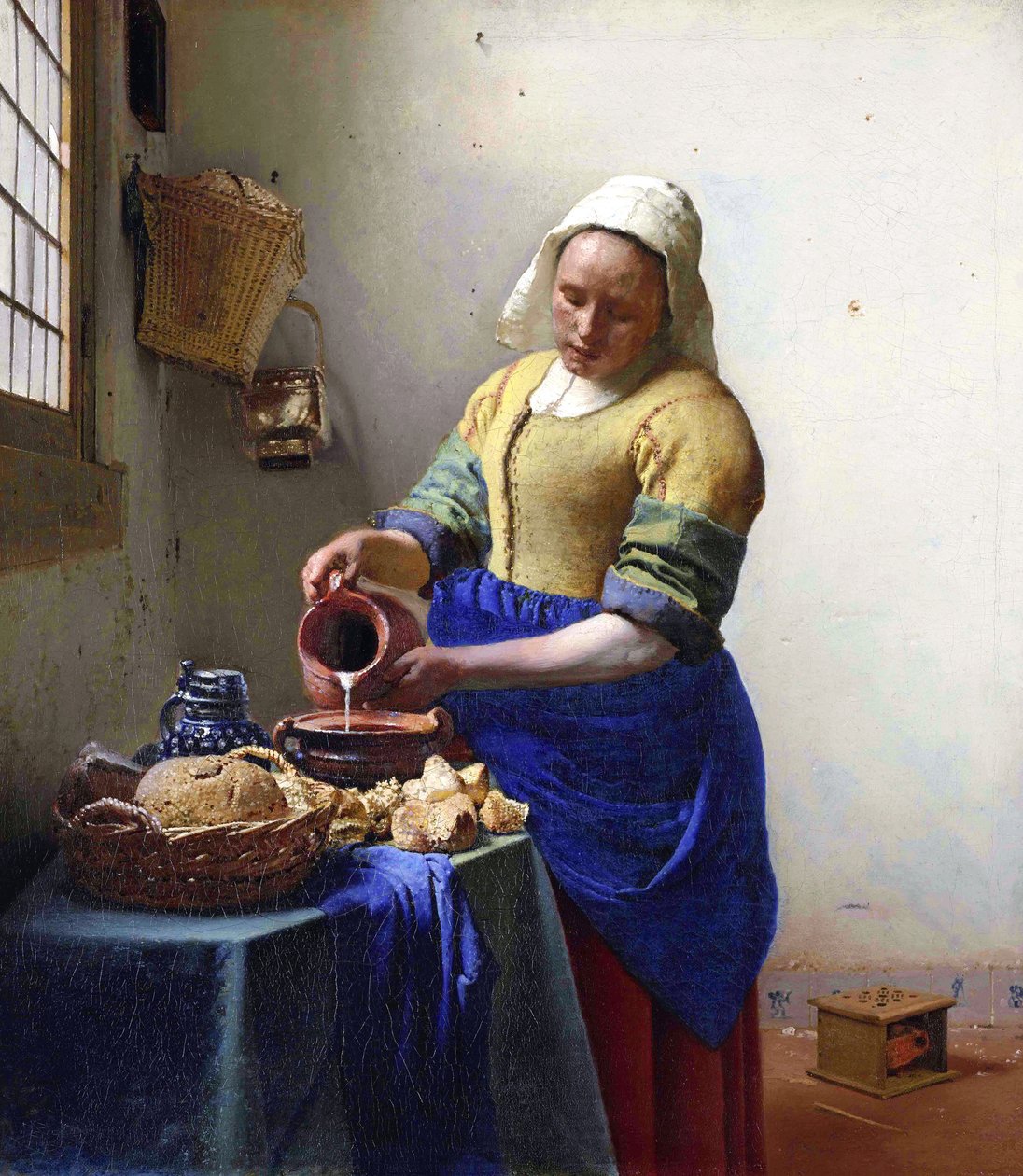 Arabiska:  Mjölkerskan av Johannes Vermeer