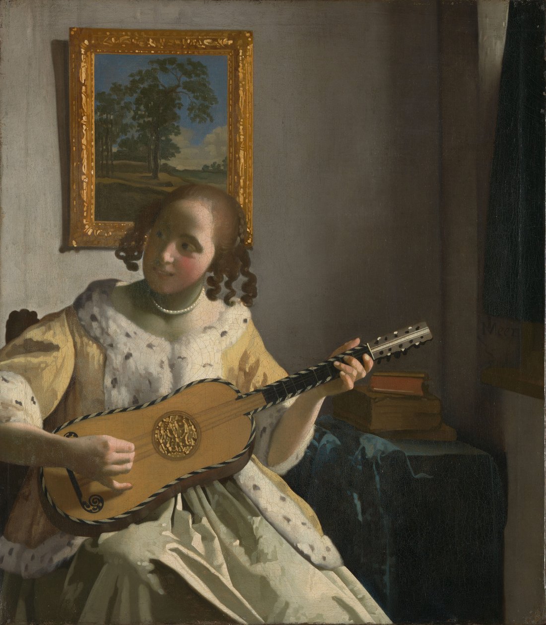 Ung kvinna spelar gitarr[1].
Alternativ titel(s):  

Gitarrspelaren[2]. av Johannes Vermeer