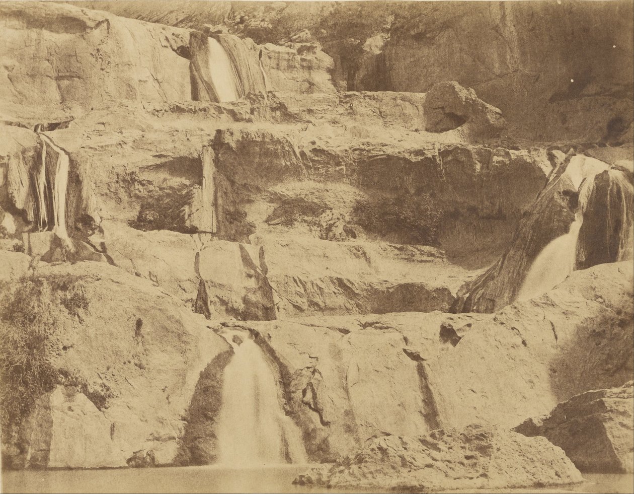 (El-Ourit Waterfall, Tlemcen, Algeriet) av John Beasly Greene