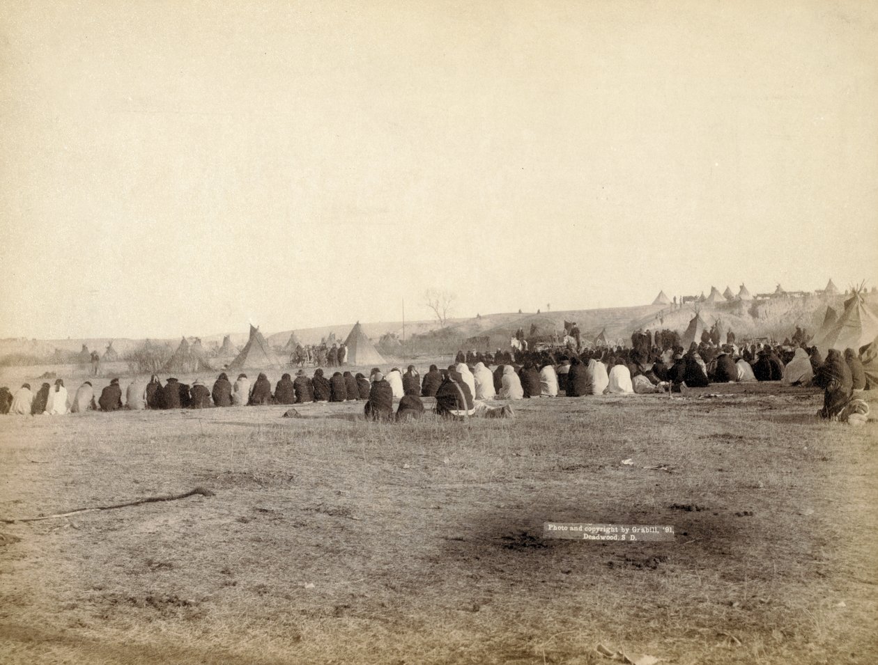 Indian Council i fientligt läger, 1891 av John C. H. Grabill