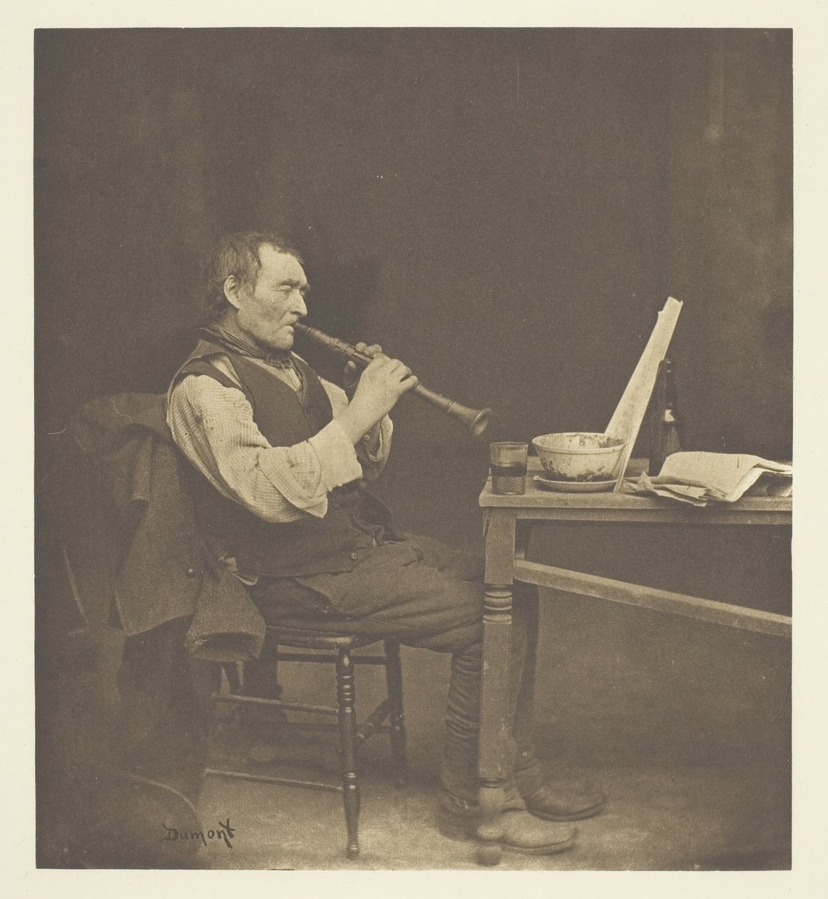 Klarionetspelare, c. 1897. av John E. Dumont