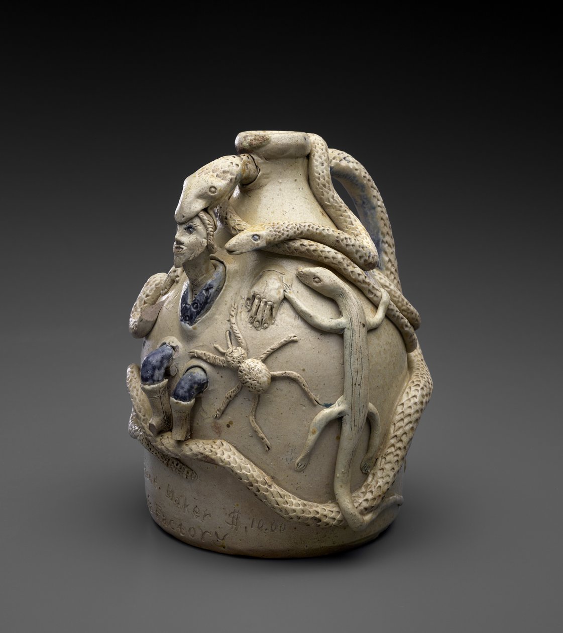 Temperancekanna, ca 1870-72 (saltglaserat stengods med kobolt- och slipdekor) av John Lewis Stone