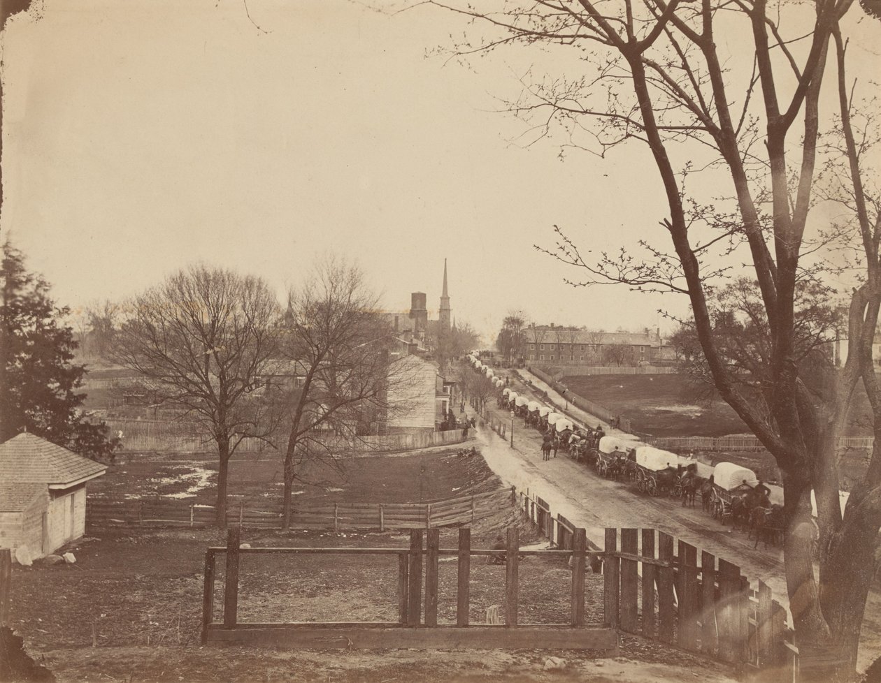 Tåg av armévagnar in i Petersburg, Virginia, april 1865. av John Reekie