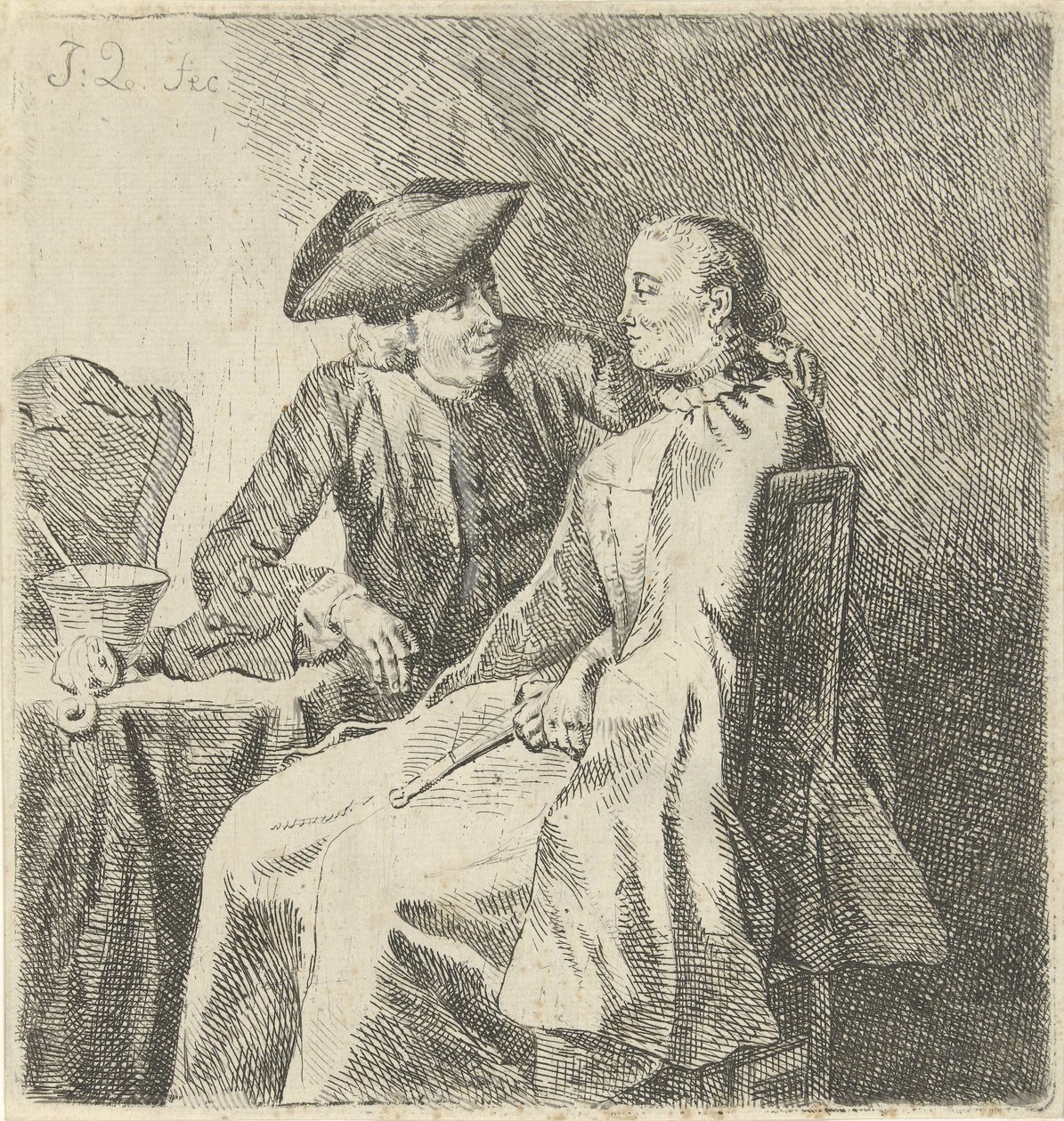 Man och kvinna vid ett bord av Julius Henricus Quinkhard