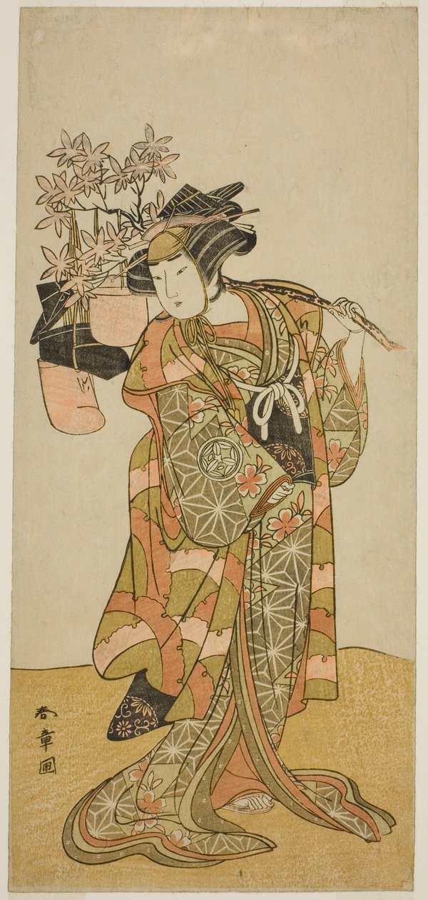 Skådespelaren Yamashita Kinsaku II som Odai, en Eboshi (hat)säljare, i pjäsen Hana-zumo Genji Hiiki, framförd på Nakamura Theatre i den elfte månaden, 1775 av Katsukawa Shunsho